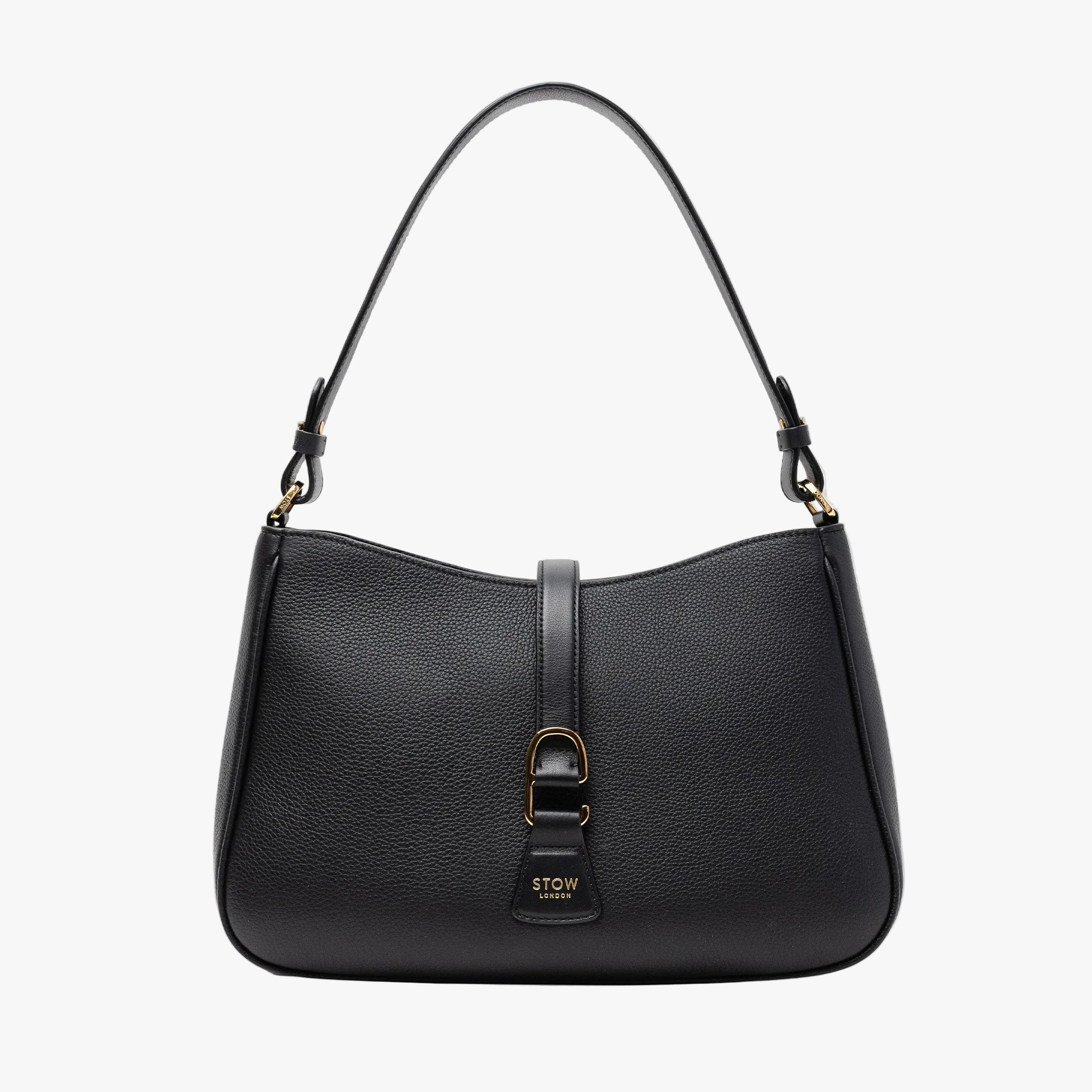 STOW London's Beth bag in Black pebbled and smooth leather featuring gold-coated stainless steel hardware and clip on a white background