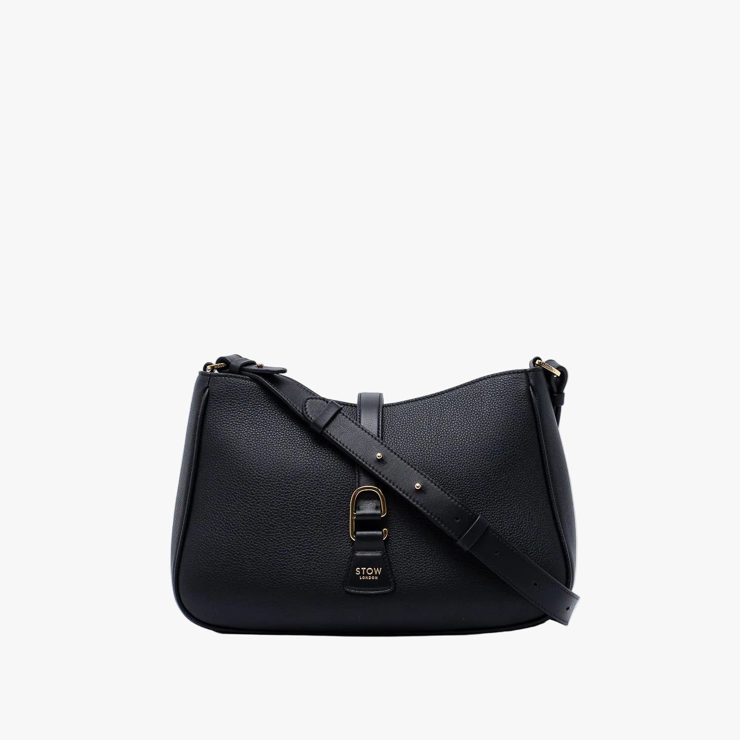 STOW London's Beth bag and detachable crossbody strap in Black leather featuring gold stainless steel hardware on a white background
