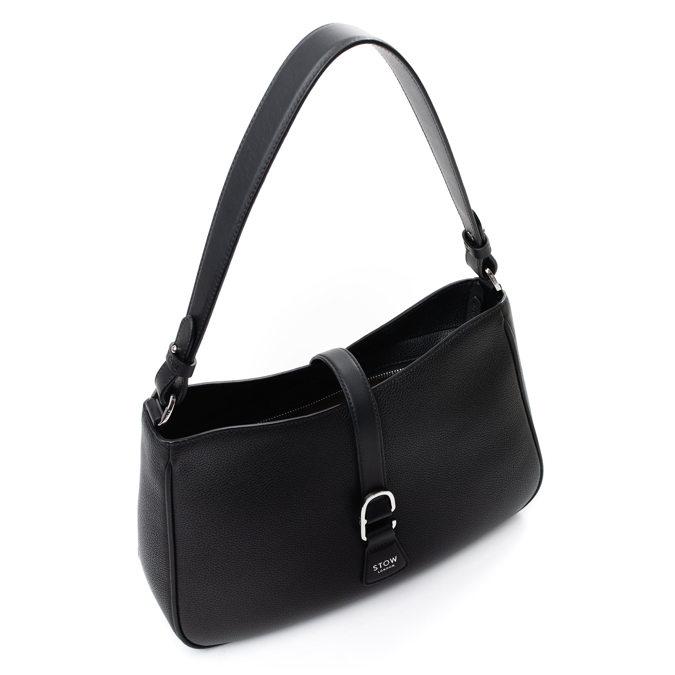 Top angled view of STOW London's Beth bag in Black pebbled and smooth leather featuring silver stainless steel hardware and clip on a white background