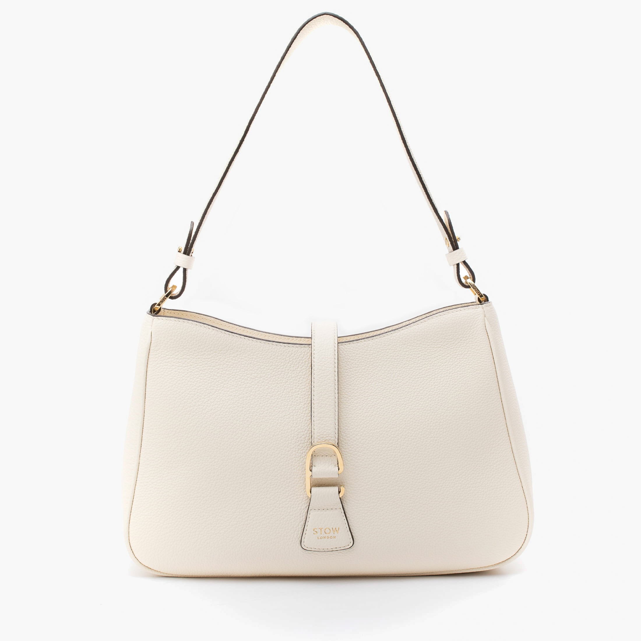 STOW London's Beth bag in Spring Moon pebbled and smooth leather featuring gold-coated stainless steel hardware and clip on a white background