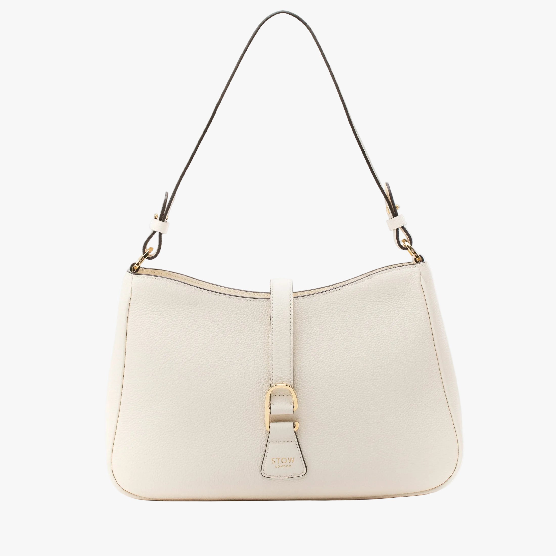 STOW London's Beth bag in Spring Moon pebbled and smooth leather featuring gold-coated stainless steel hardware and clip on a white background