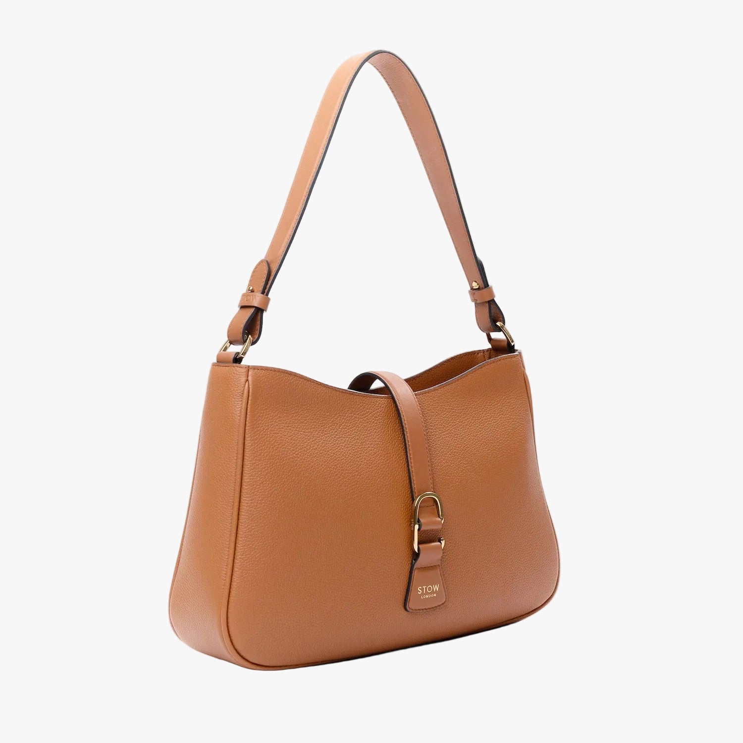Off-axis view of STOW London's Beth Shoulder bag in Earth Tan pebbled leather featuring gold-coated stainless steel hardware and clip on a light grey background