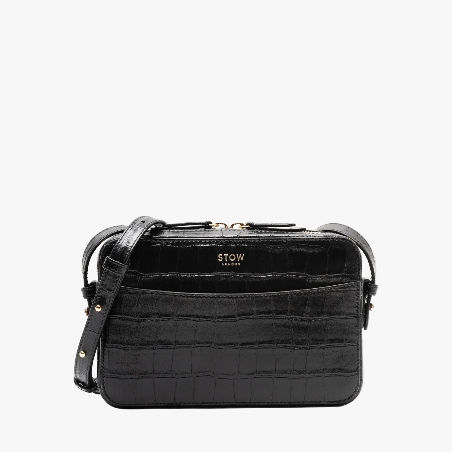 STOW London's Camera bag in Black Embossed Croc leather with detachable crossbody strap featuring gold-coated stainless steel hardware on a white background