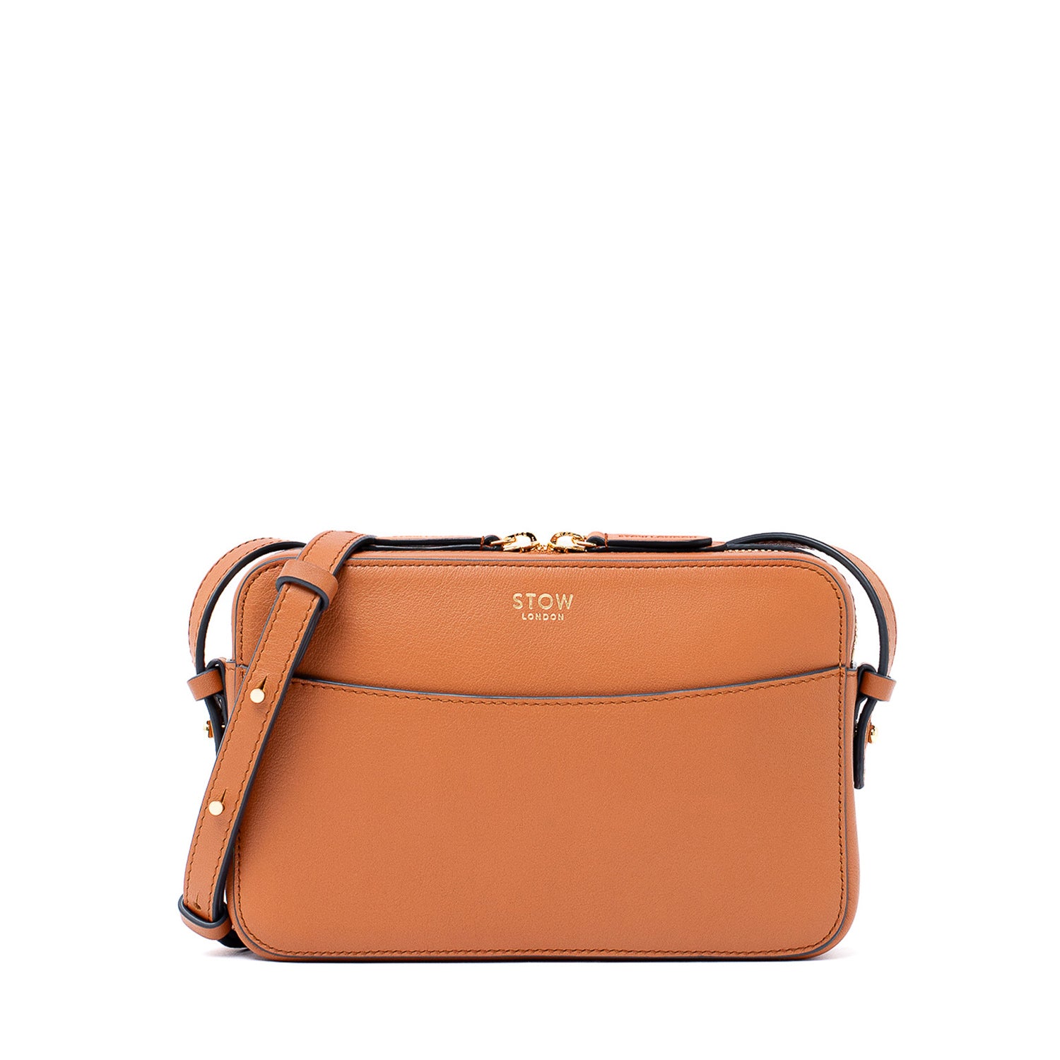 STOW London's Camera bag in Earth Tan smooth leather with detachable crossbody strap featuring gold-coated stainless steel hardware on a white background