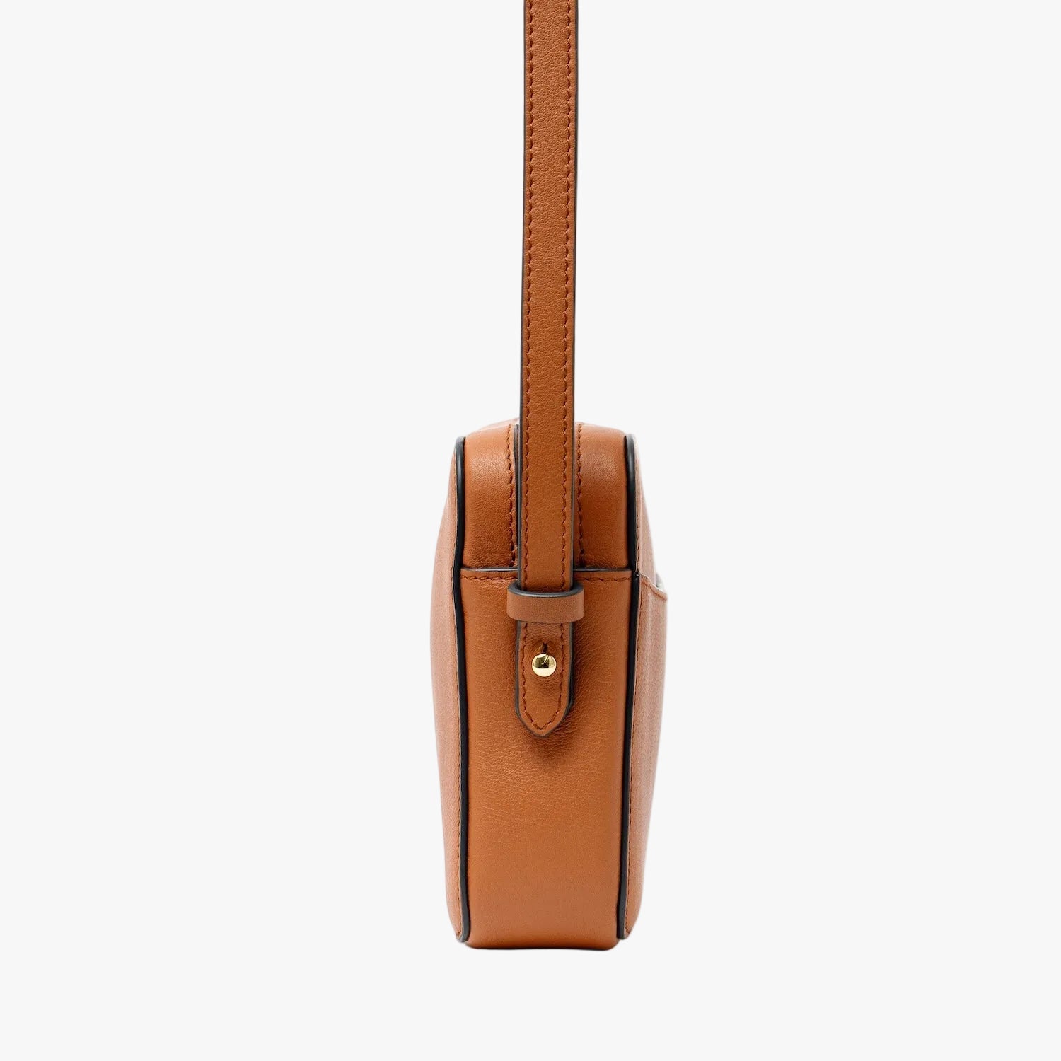 Side view of STOW London's Camera bag in Earth Tan Smooth leather featuring gold-coated stainless steel hardware and detachable crossbody strap on a light grey background