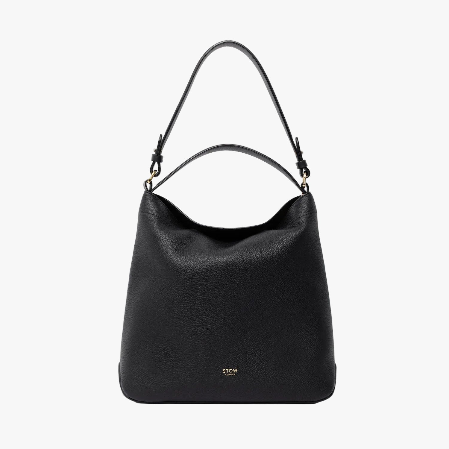 STOW London's Curve in Black leather on a light grey background featuring the detachable shoulder strap and top handle with gold hardware and details