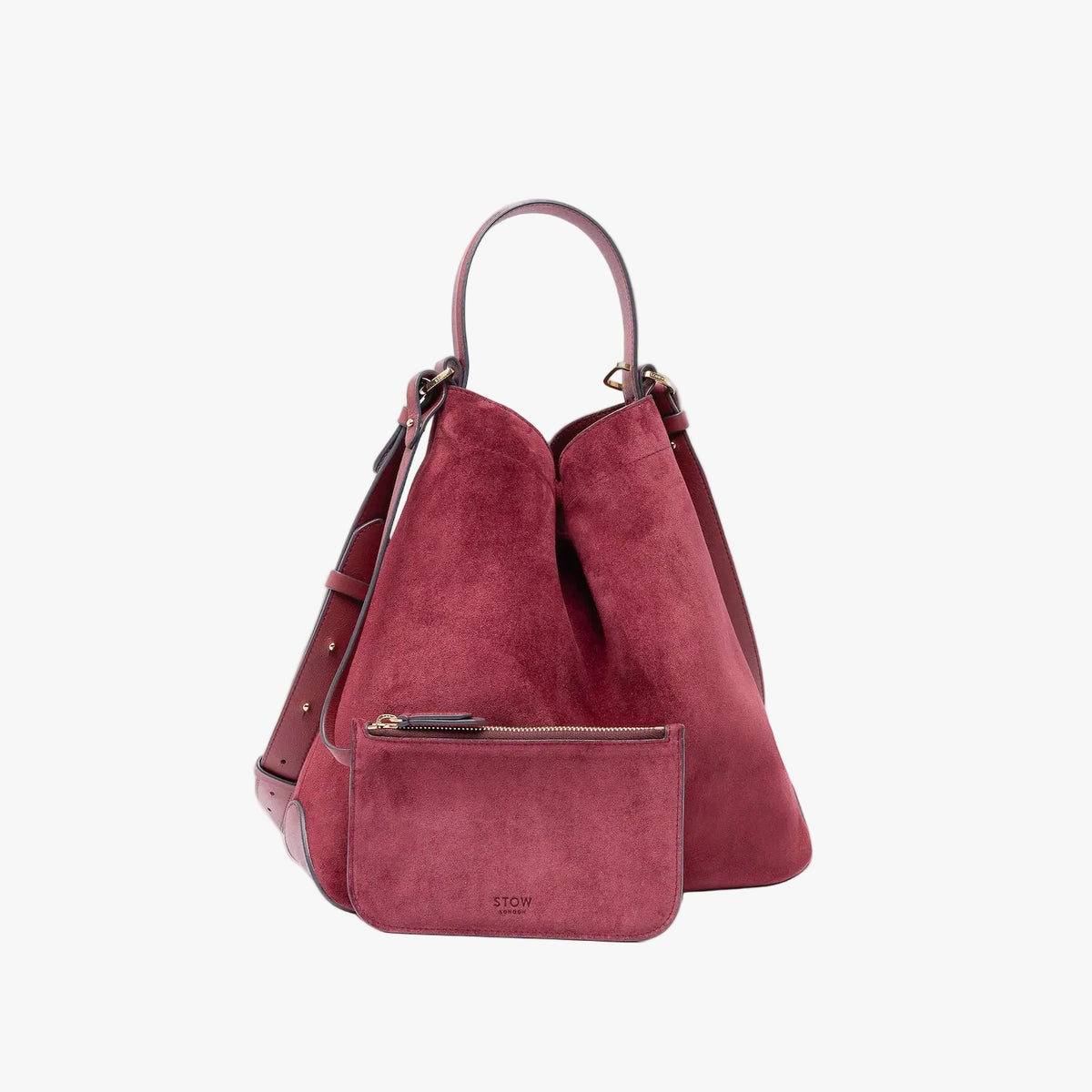 Stow London's Curve bag and matching, detachable interior pouch in Burgundy suede leather featuring gold-coated stainless steel hardware on a light grey background