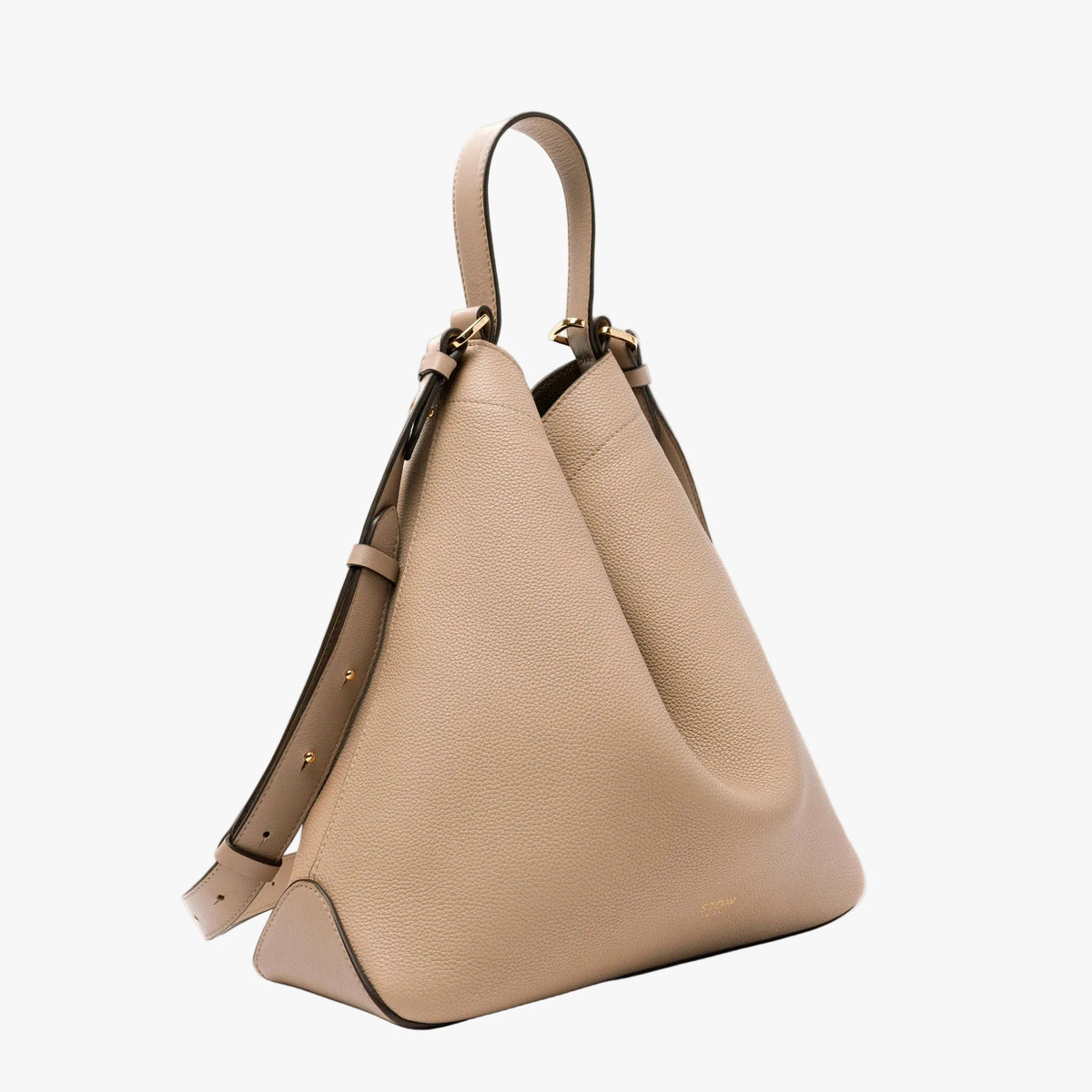 Off-axis view of STOW London's Curve bag in Camel pebbled leather featuring gold-coated stainless steel hardware on a light grey background
