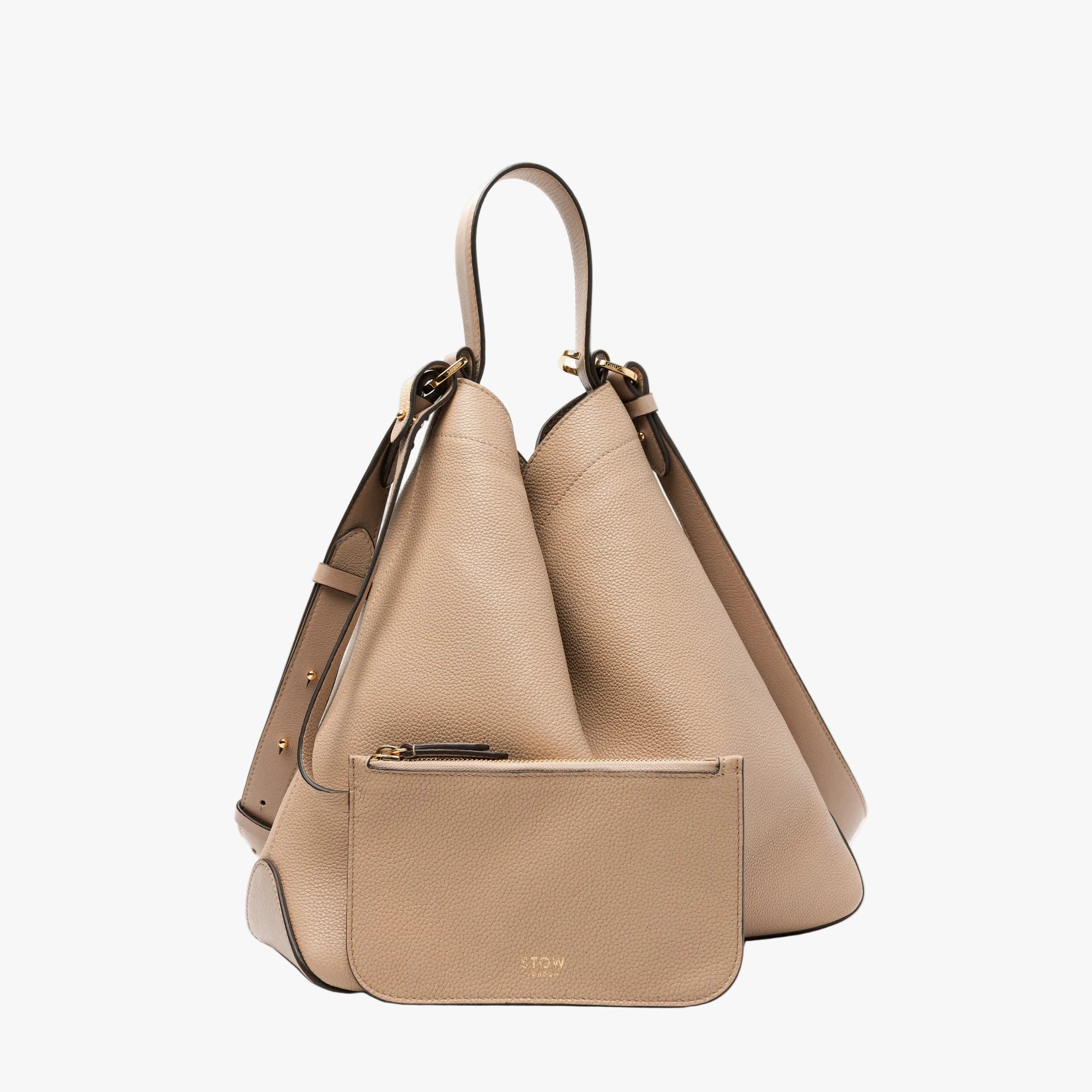 STOW London's Curve bag in Camel pebbled leather with its matching detachable zip pouch featuring gold-coated stainless steel hardware on a light grey background