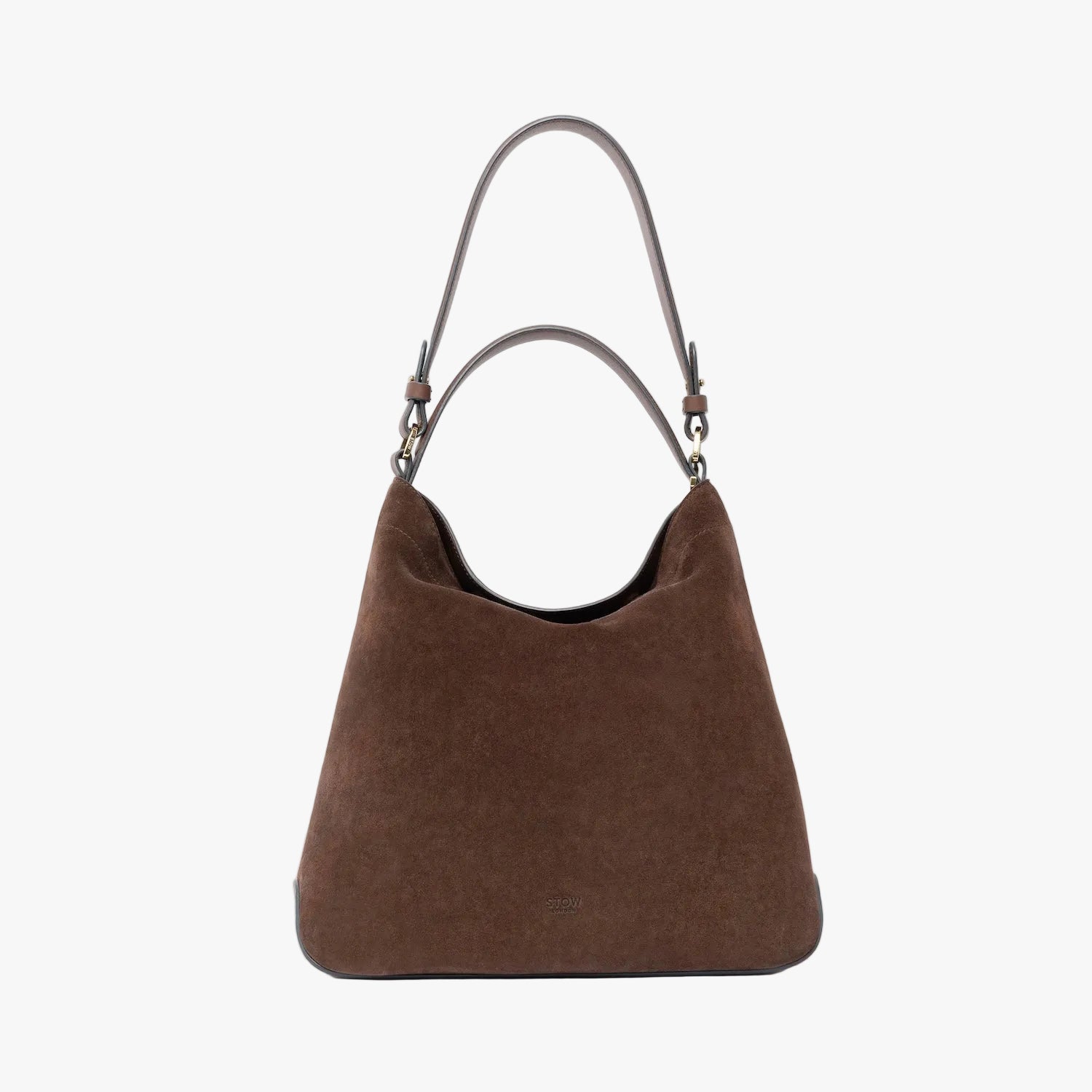 STOW London's Curve in Black leather on a light grey background featuring the detachable shoulder strap and top handle with gold hardware and details