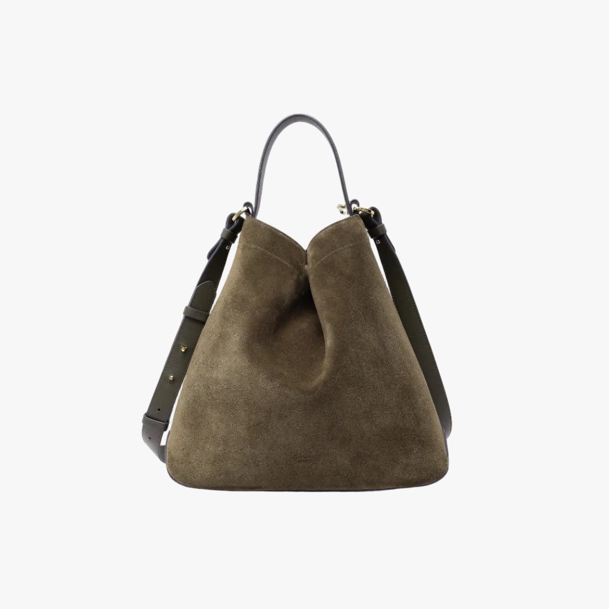 Stow London's Curve bag in Dark Green suede leather shaped in a triangular form featuring gold-coated stainless steel hardware on a light grey background