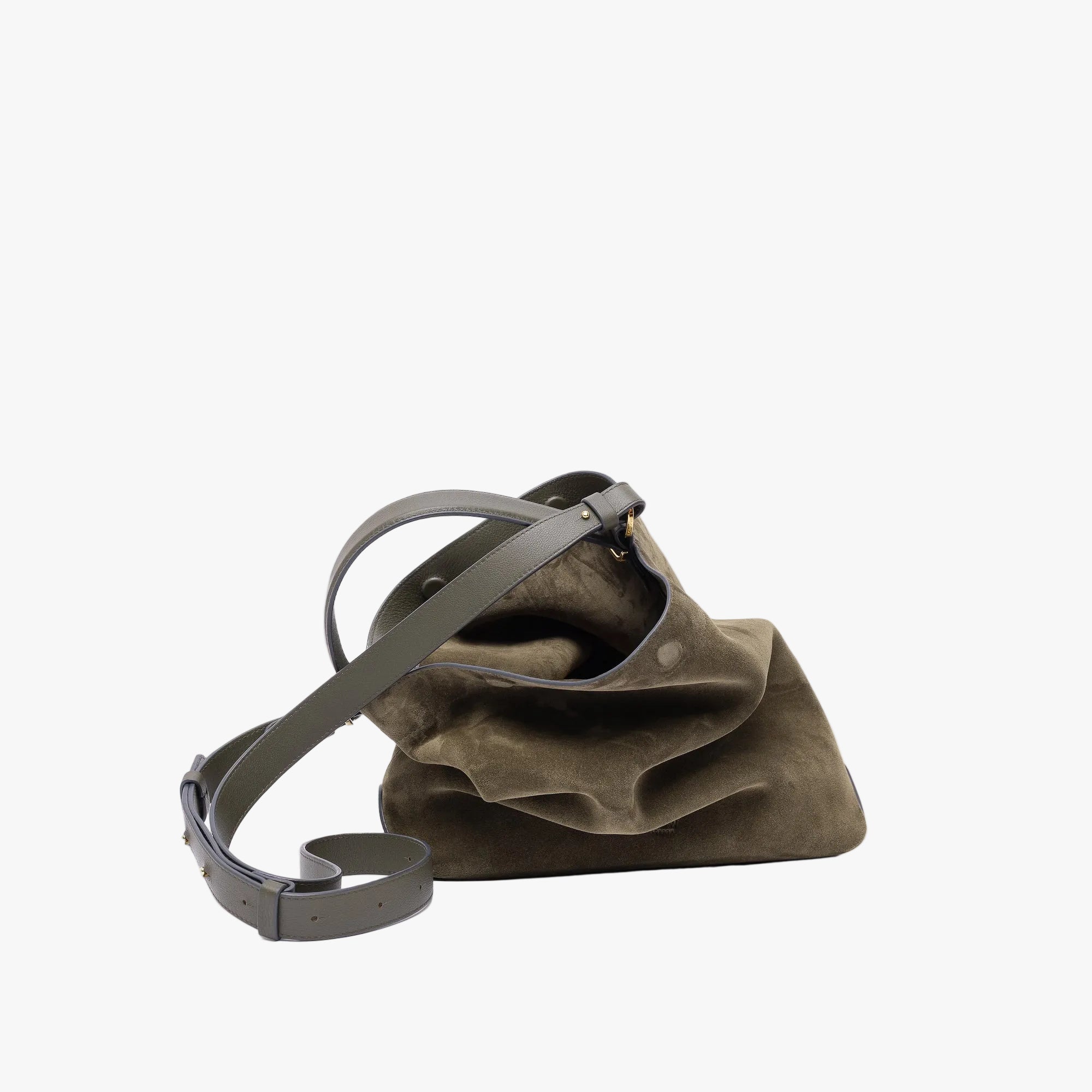 Stow London's Curve bag in Dark Green suede leather and detachable crossbody strap featuring gold-coated stainless steel hardware on a light grey background