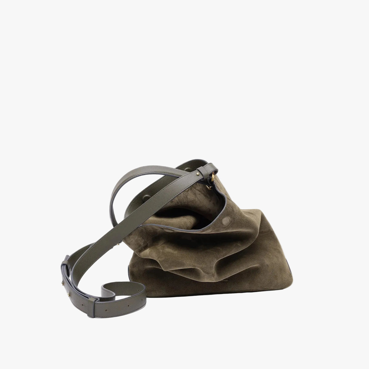 Stow London's Curve bag in Dark Green suede leather and detachable crossbody strap featuring gold-coated stainless steel hardware on a light grey background