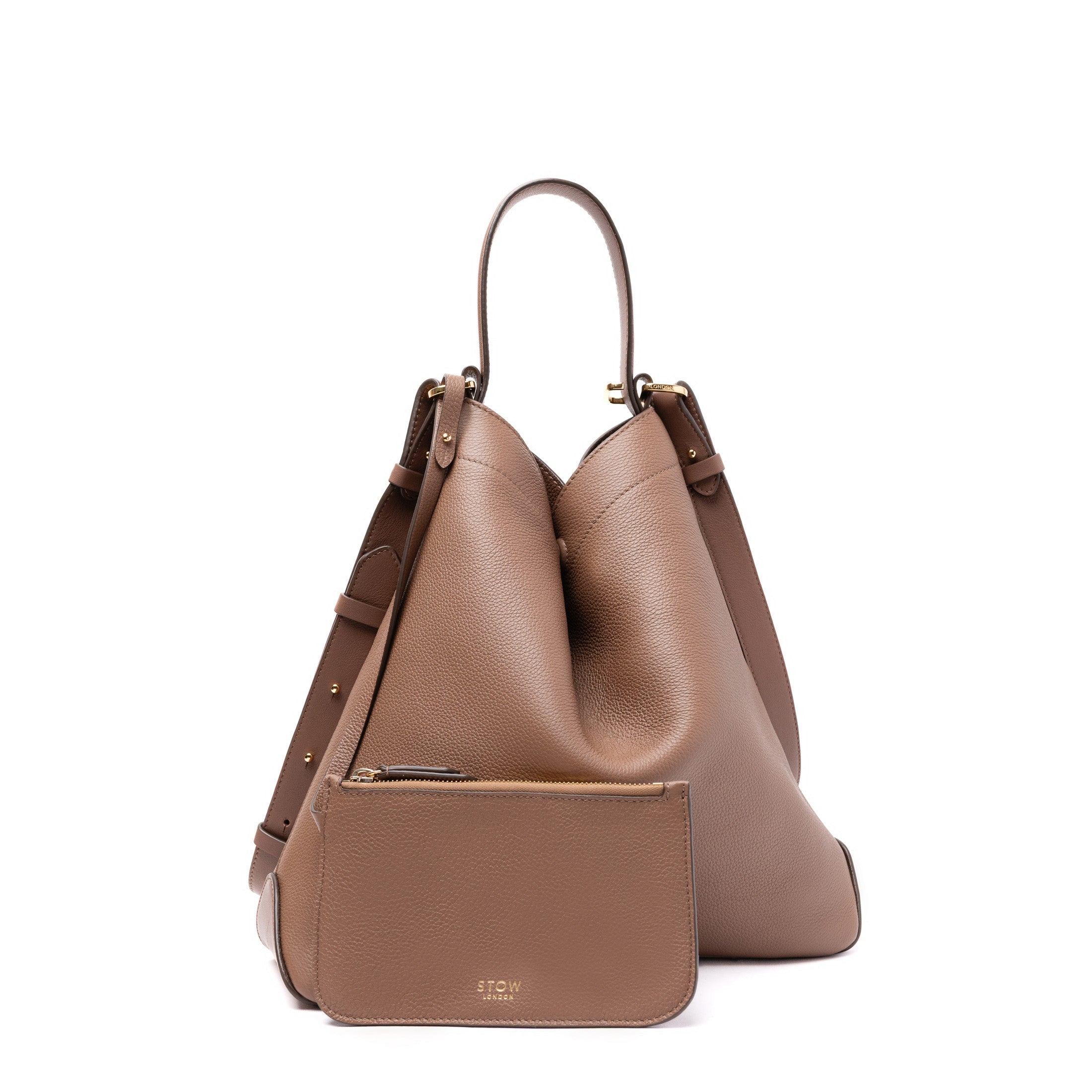 Front view of STOW London's Curve in Mocha pebbled and smooth leather with its matching interior pouch featuring gold-coated stainless steel hardware on a white background
