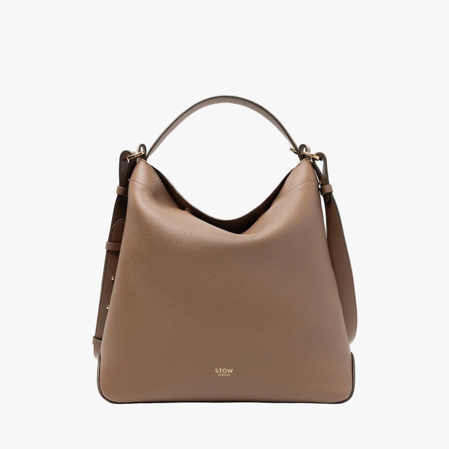 STOW London's Curve bag in Mocha pebbled leather featuring gold-coated stainless steel hardware on a light grey background
