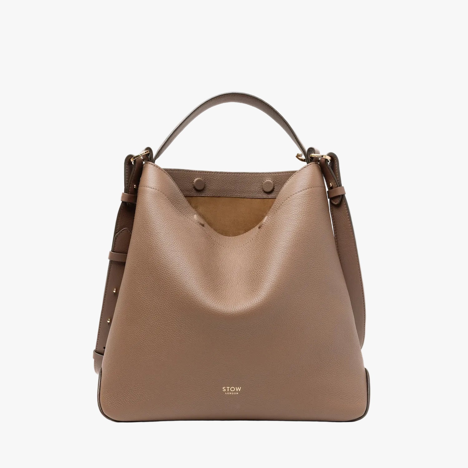 STOW London's Curve bag in Mocha pebbled leather featuring gold-coated stainless steel hardware on a light grey background
