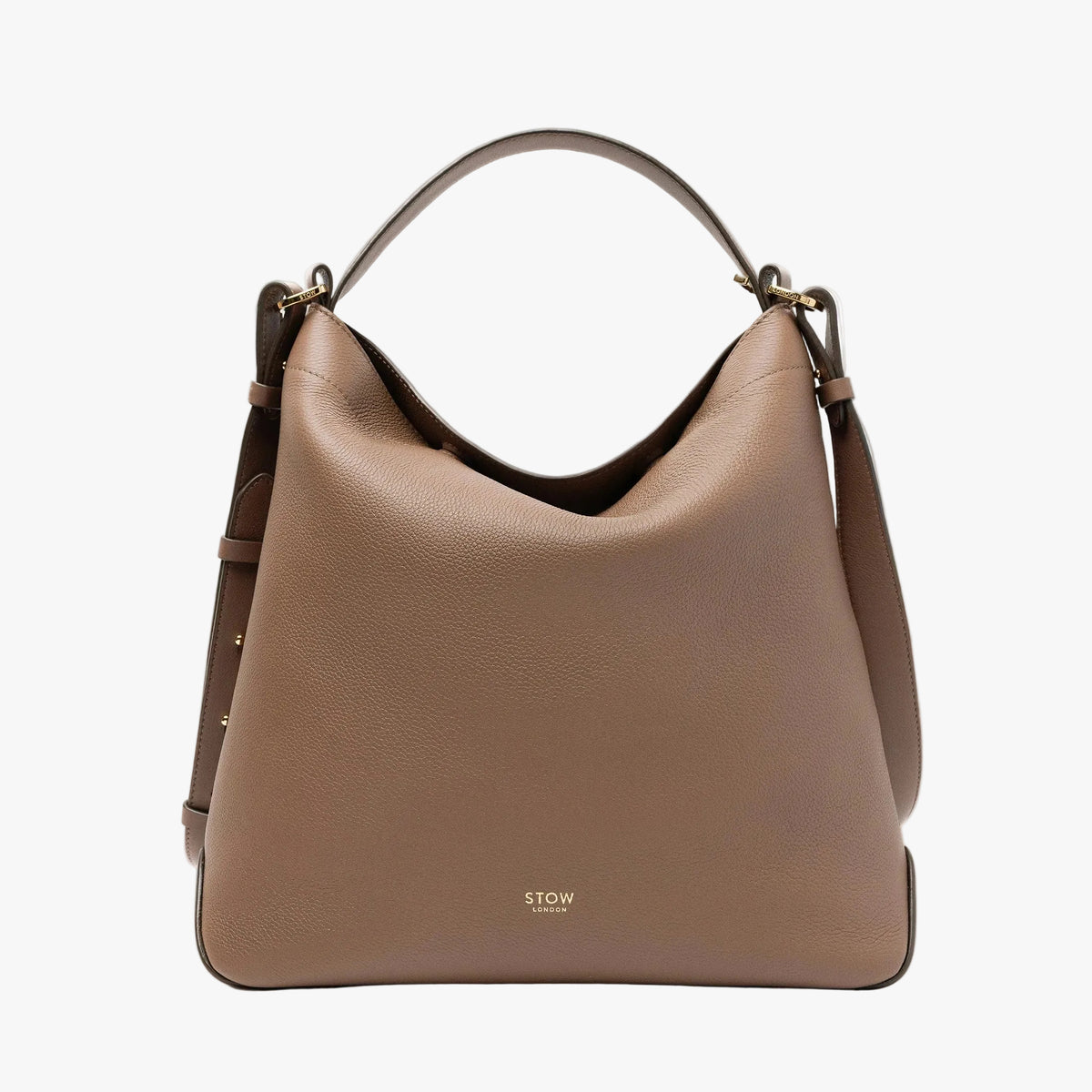STOW London's Curve bag in Mocha pebbled leather featuring gold-coated stainless steel hardware on a light grey background