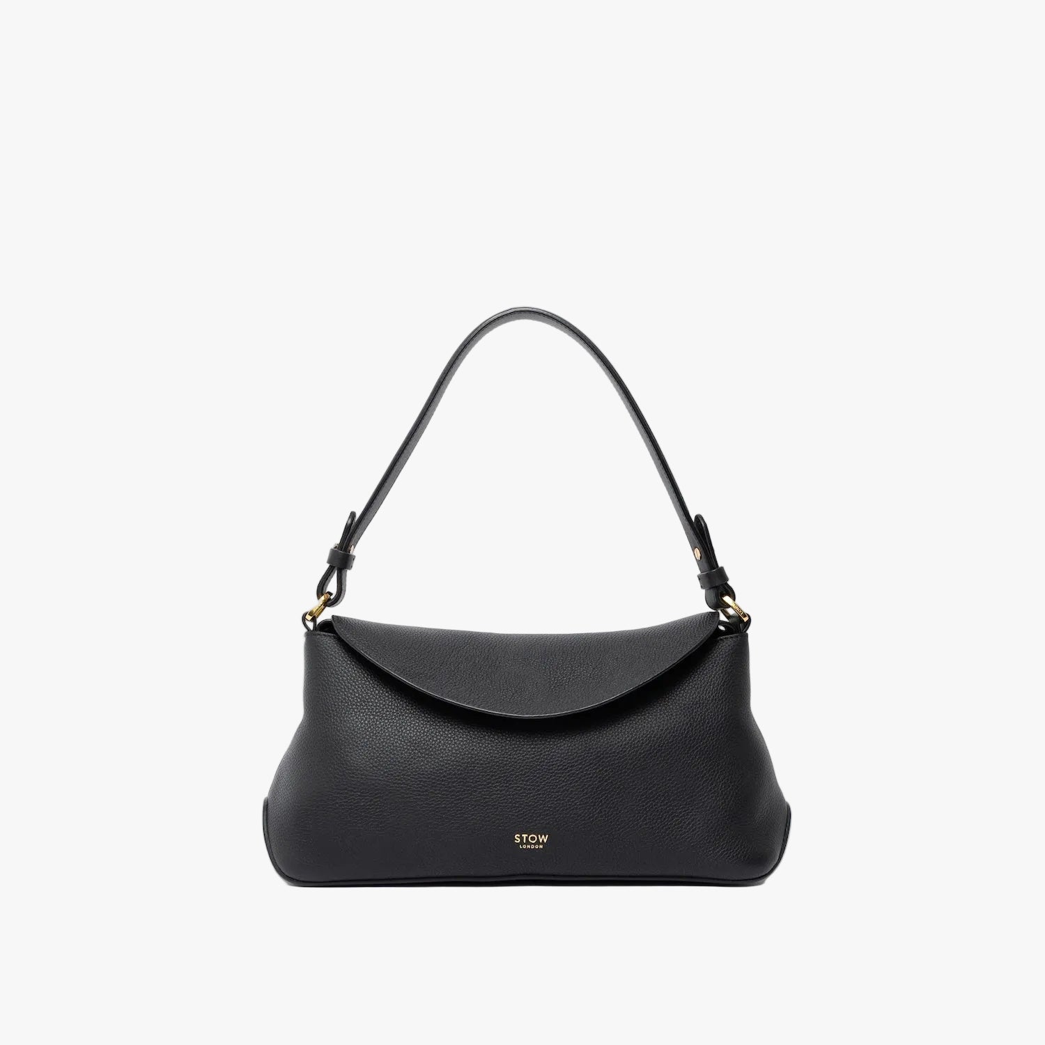 STOW London's East West in Black leather on a light grey background featuring the detachable shoulder strap with gold hardware and details