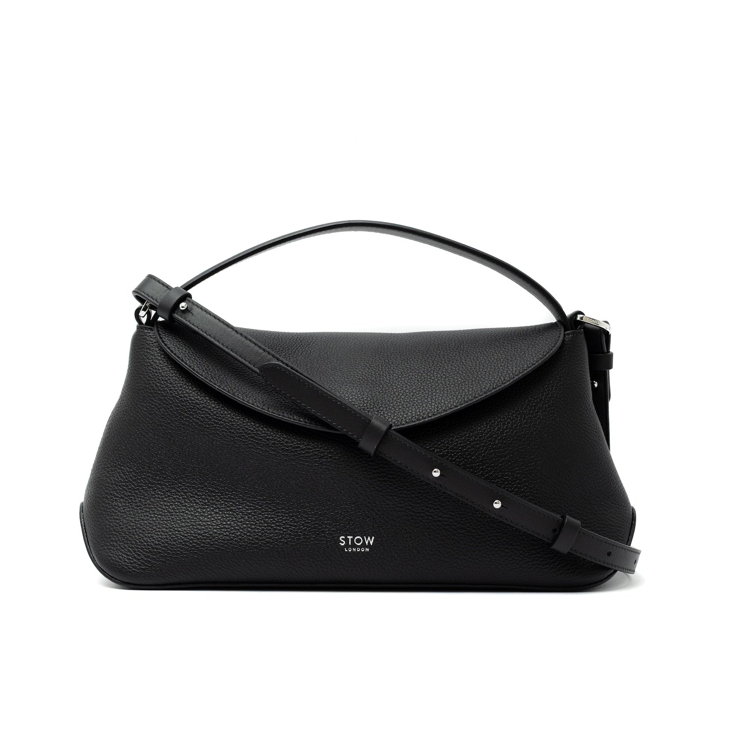 STOW London's East West bag and detachable, adjustable strap in Black pebbled and smooth leather featuring silver stainless steel hardware on a white background