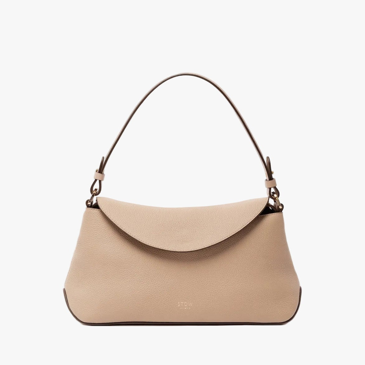 STOW London's East West in Camel leather on a light grey background featuring the detachable shoulder strap with gold hardware and details