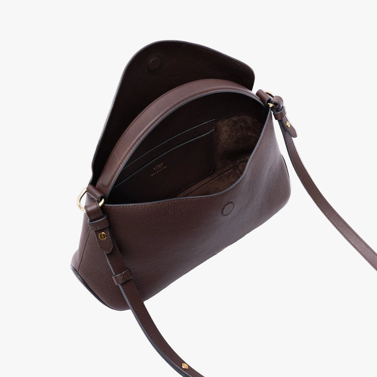 STOW London's East West in Espresso pebbled leather on a light grey background with flap open showing the chocolate suede interior and leather slip pocket featuring gold-coated stainless steel hardware