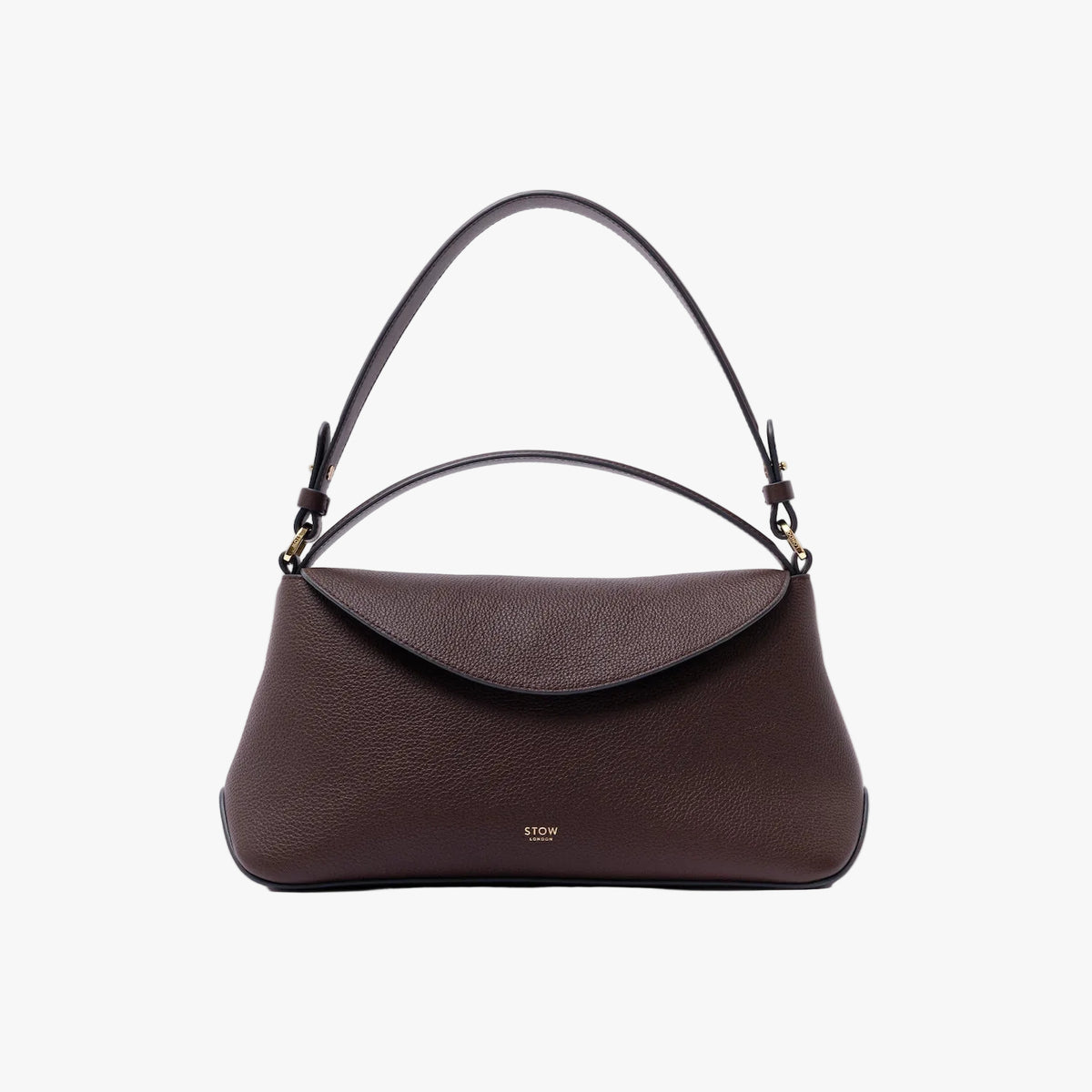 STOW London's East West in Espresso pebbled leather on a light grey background featuring the detachable shoulder strap and gold-coated stainless steel hardware