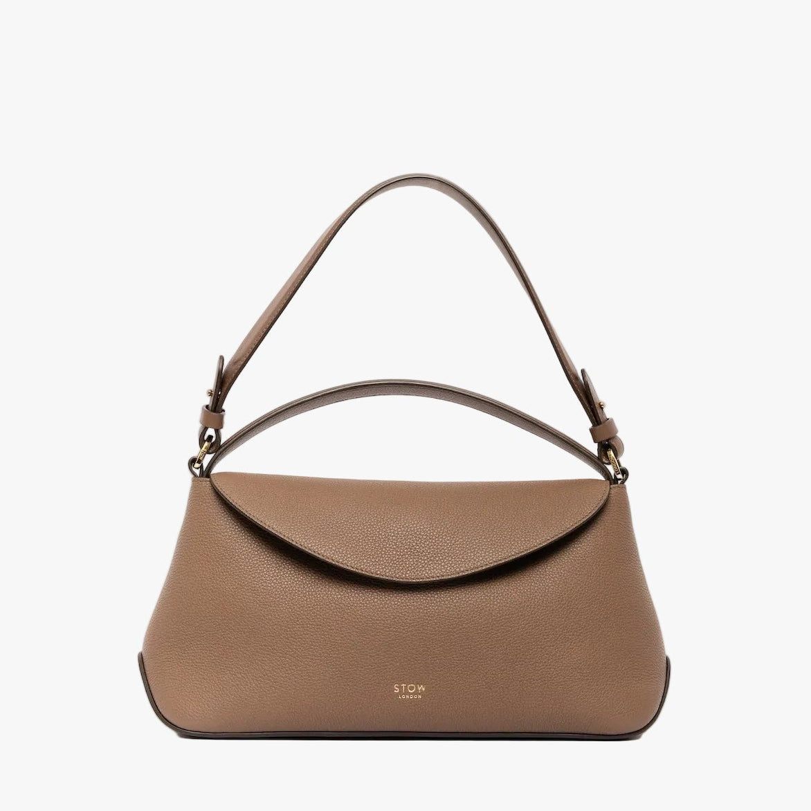 STOW London's East West bag in Mocha pebbled leather with the shoulder strap attached and top handle out featuring gold-coated stainless steel hardware on a light grey background
