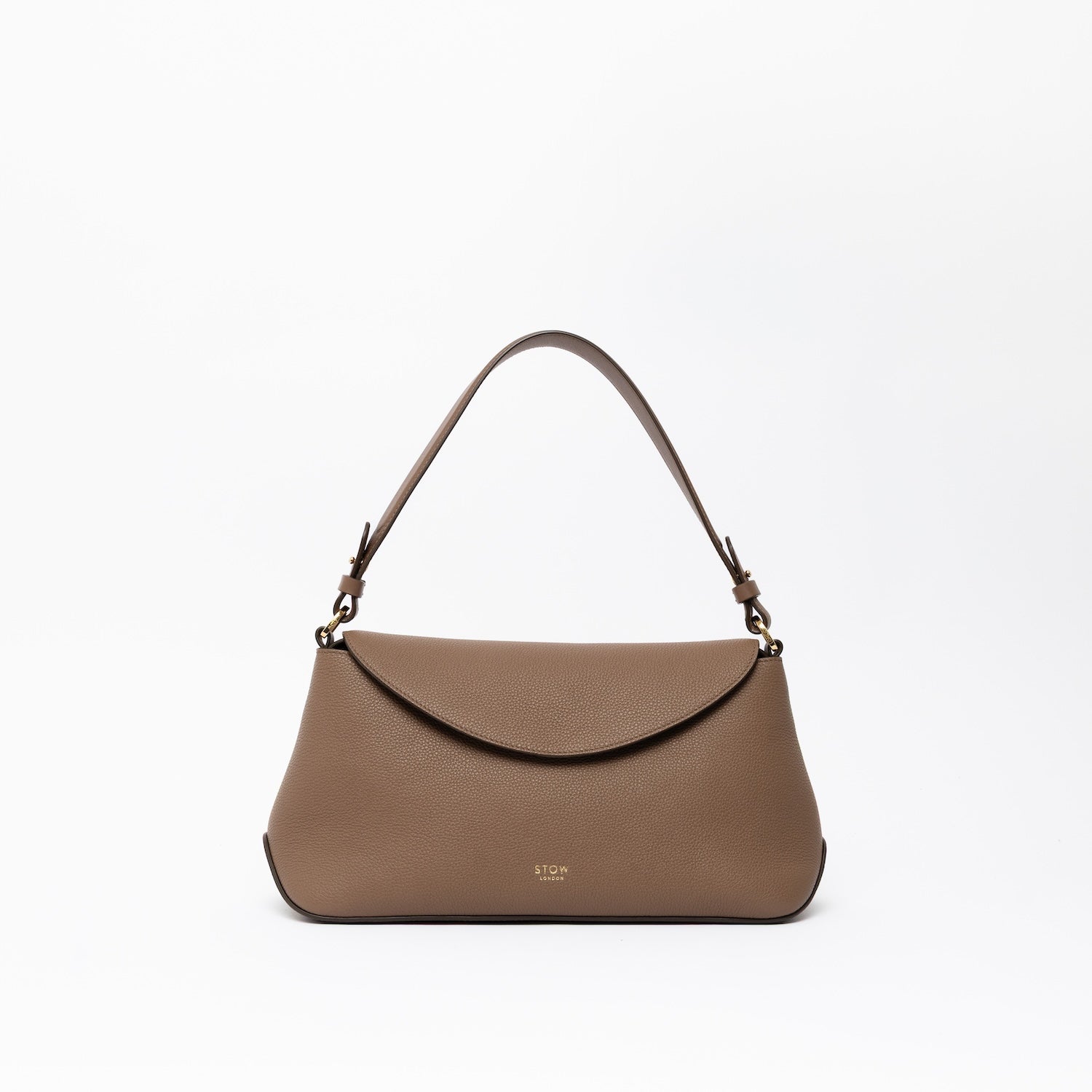 STOW London's East West and detachable shoulder strap in Mocha leather on a light grey background featuring gold hardware and details
