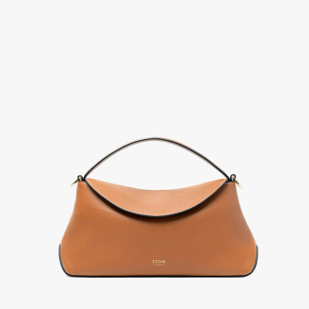 TOW London's East West bag in Earth Tan pebbled leather and crossbody strap featuring gold-coated stainless steel hardware on a light grey background