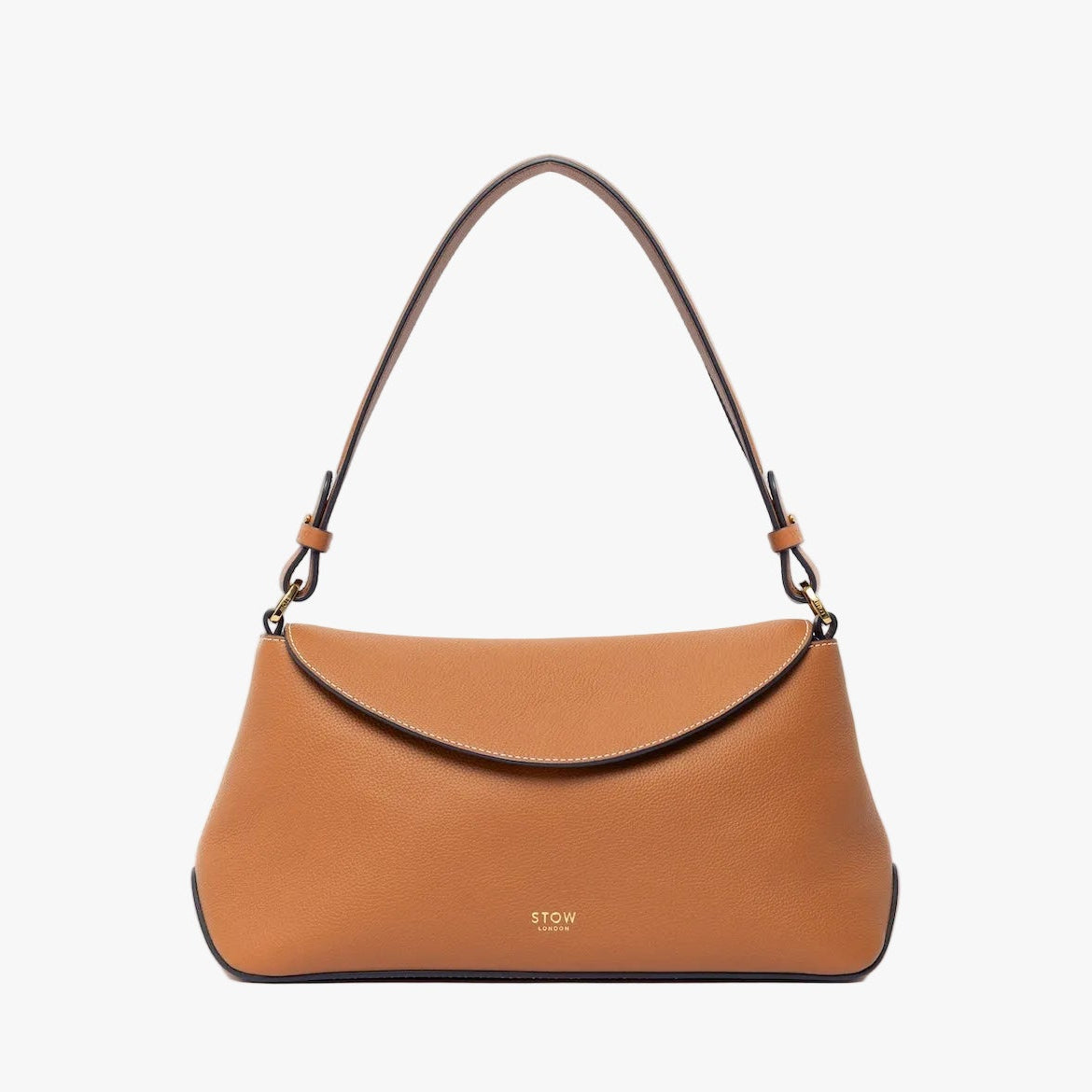 STOW London's East West and detachable shoulder strap in Earth Tan leather on a light grey background featuring gold hardware and details