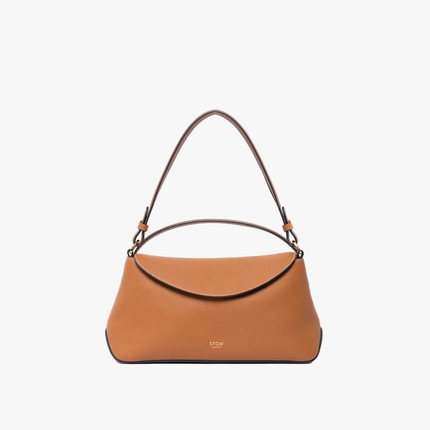 STOW London's East West and detachable shoulder strap in Earth Tan leather on a light grey background featuring gold hardware