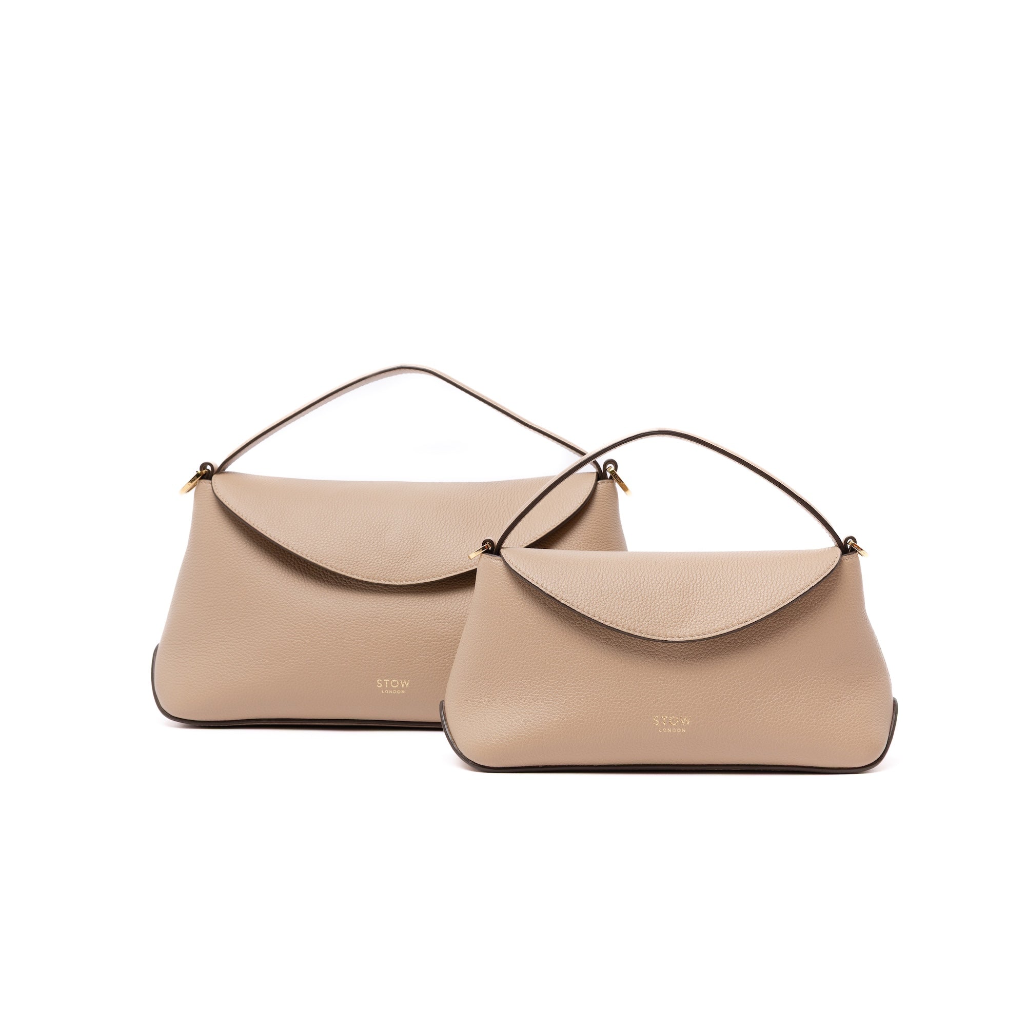Size comparison of STOW London's Mini East West in Camel leather and the bigger East West bag in Camel on a white background