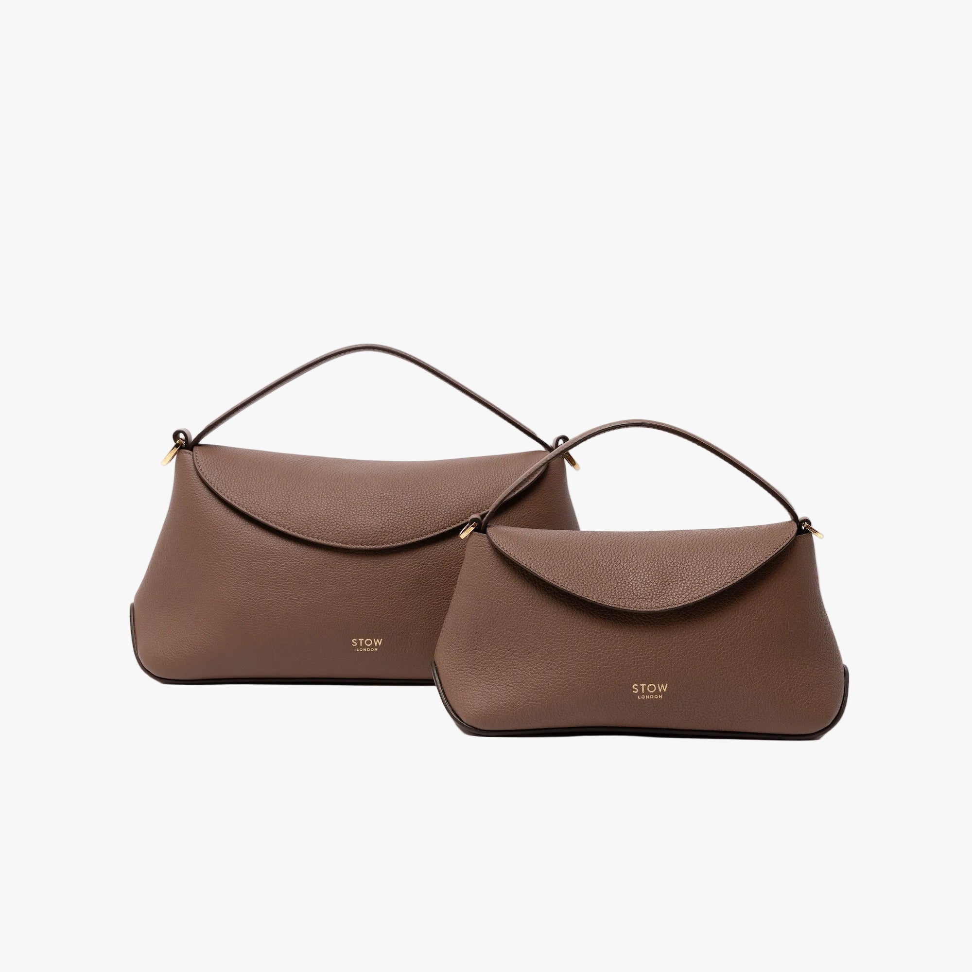 Size comparison of STOW London's Mini East West in Mocha leather and the bigger East West bag in Mocha on a white background featuring gold-coated stainless steel hardware