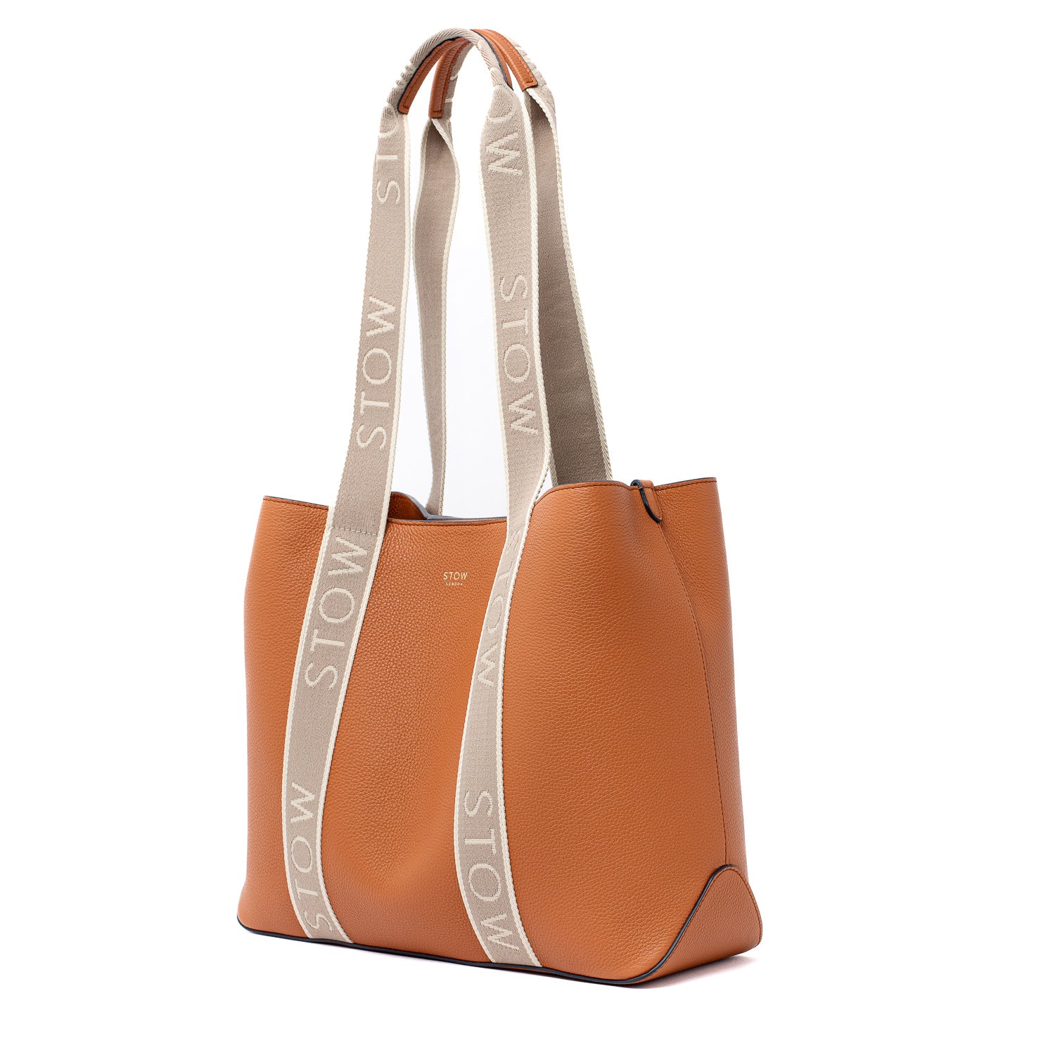 STOW London's Earth Tan Nastro Tote bag shown off-axis with handle up on a white background