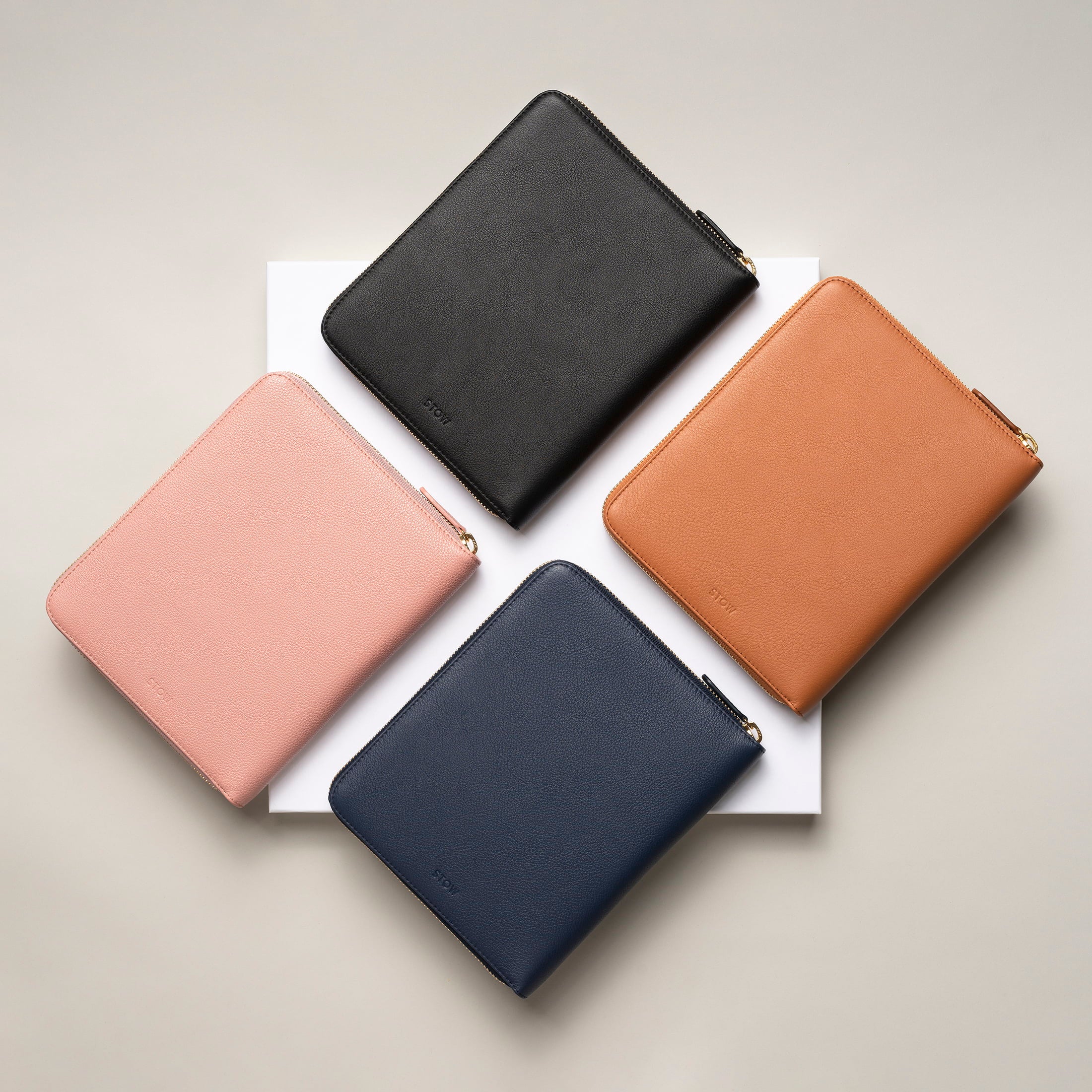 STOW London First Class Folio tech cases in various leather colours