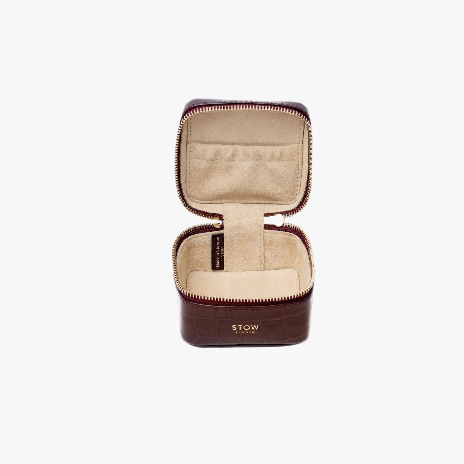 STOW London's Hester Jewellery Case in Burgundy Embossed Croc leather on a light grey background with zipper open showing the light Goat's suede interior and elasticated pocket