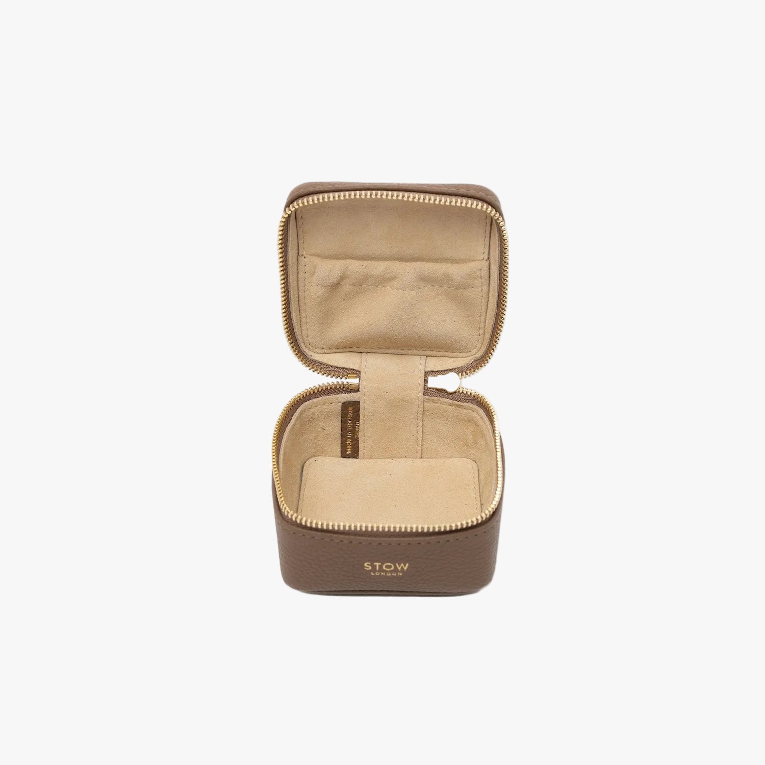 STOW London's Hester Jewellery Case in Mocha pebbled leather on a light grey background with zipper open showing the light Goat's suede interior and elasticated pocket