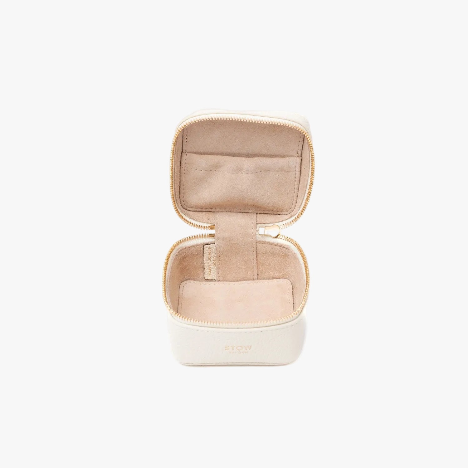 STOW London's Hester Jewellery Case in Spring Moon pebbled leather on a light grey background with zipper open showing the light Goat's suede interior and elasticated pocket