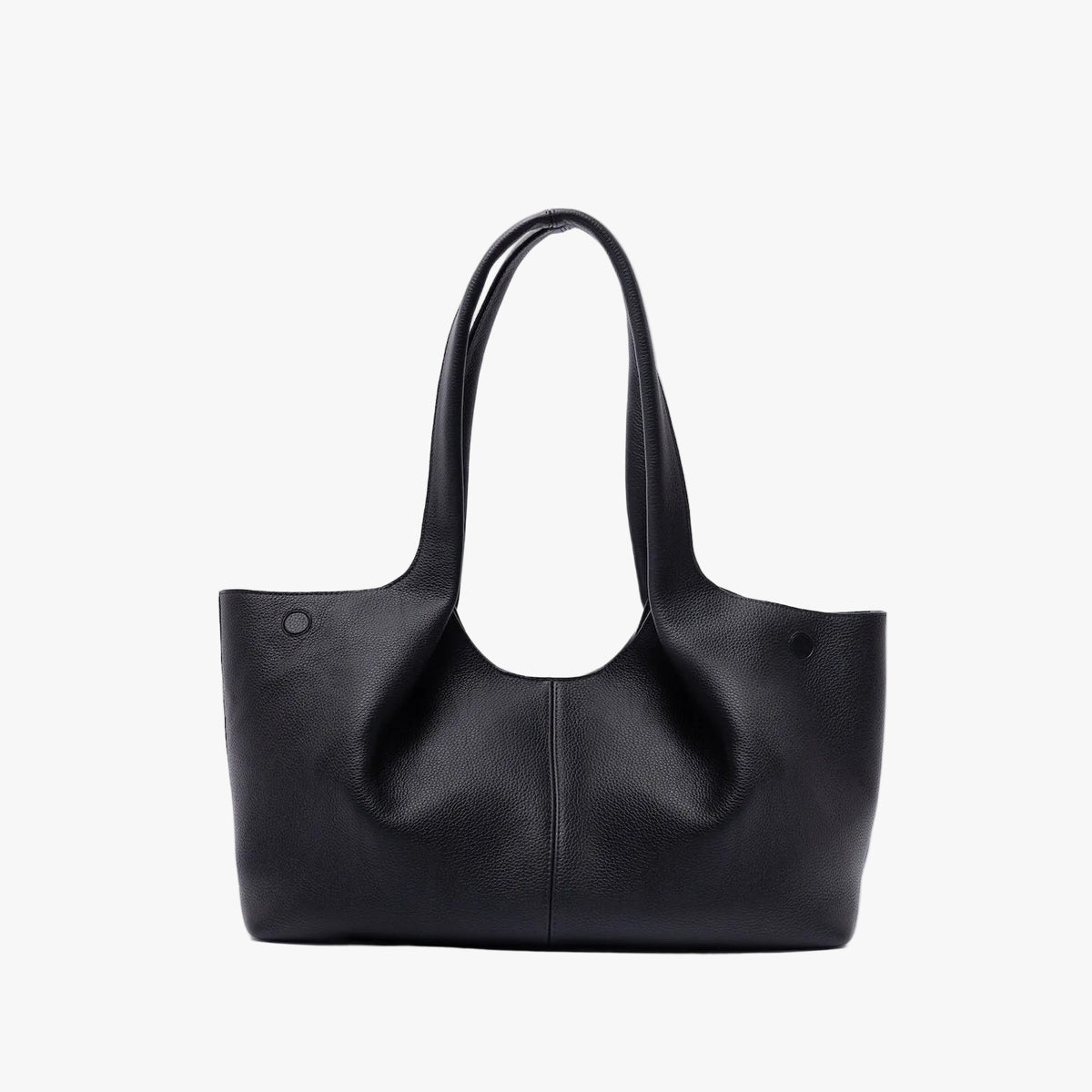 Back of STOW London's Hobo Tote in Black pebbled leather on a light grey background featuring a pleated back panel