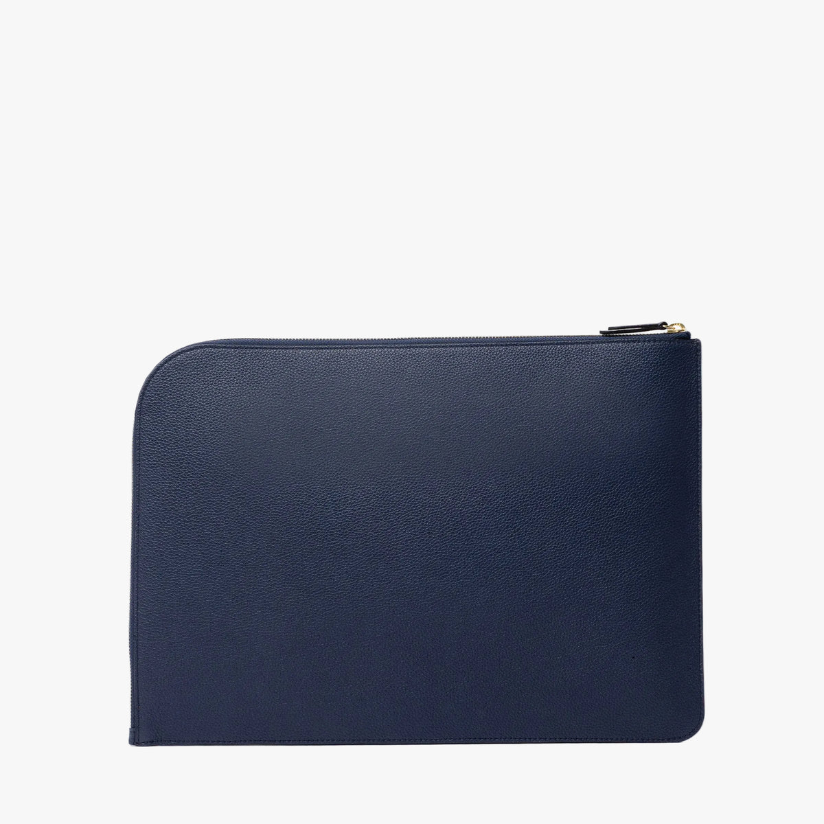 Back panel of STOW London's Leather Sleeve in Navy pebbled leather on a light grey background featuring a YKK Natulon Zip
