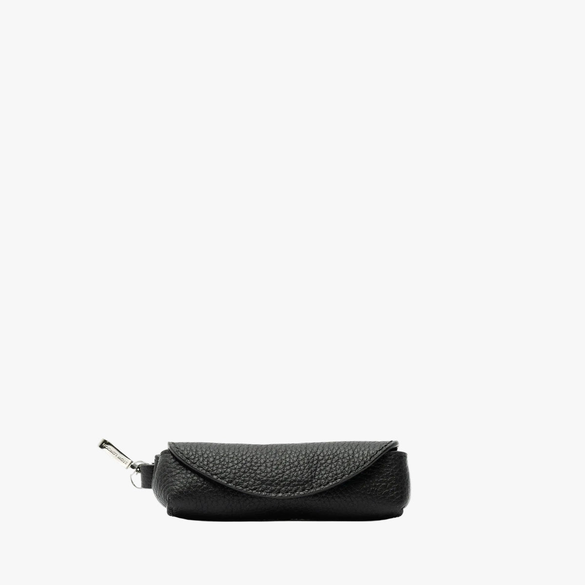 STOW London's Lipstick Case in Black pebbled leather featuring a silver stainless steel clip on a light grey background