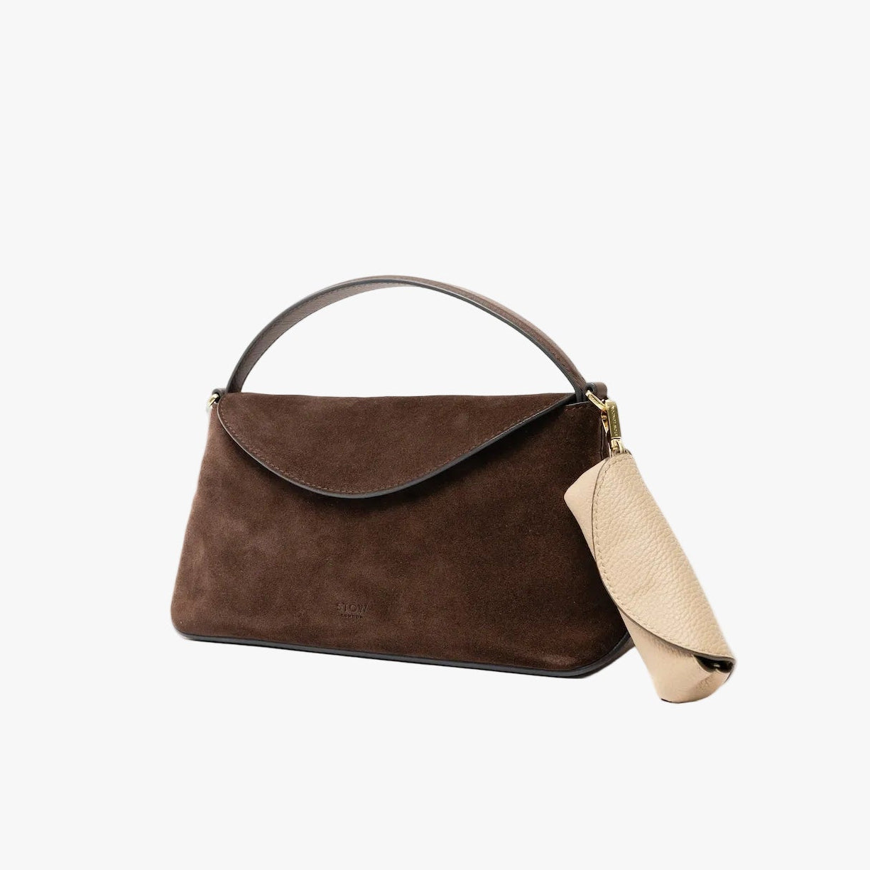 STOW London's Lipstick Case in Camel pebbled leather attached to the Mini East West in Chocolate suede leather on a light grey background featuring gold-coated stainless steel hardware
