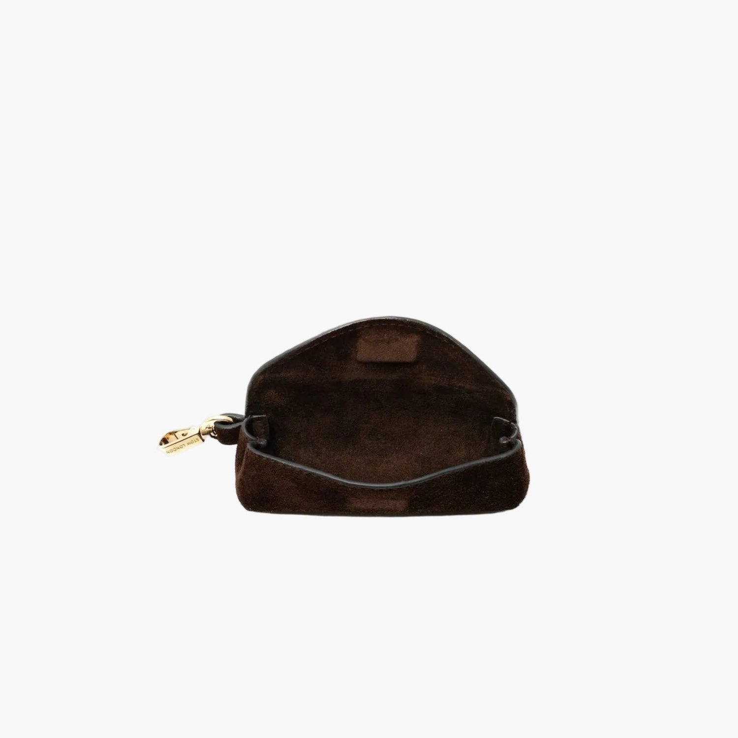 STOW London's Lipstick Case in Chocolate suede leather with flap open showing hidden magnetic closure and suede interior on a light grey background featuring a gold-coated stainless steel clip