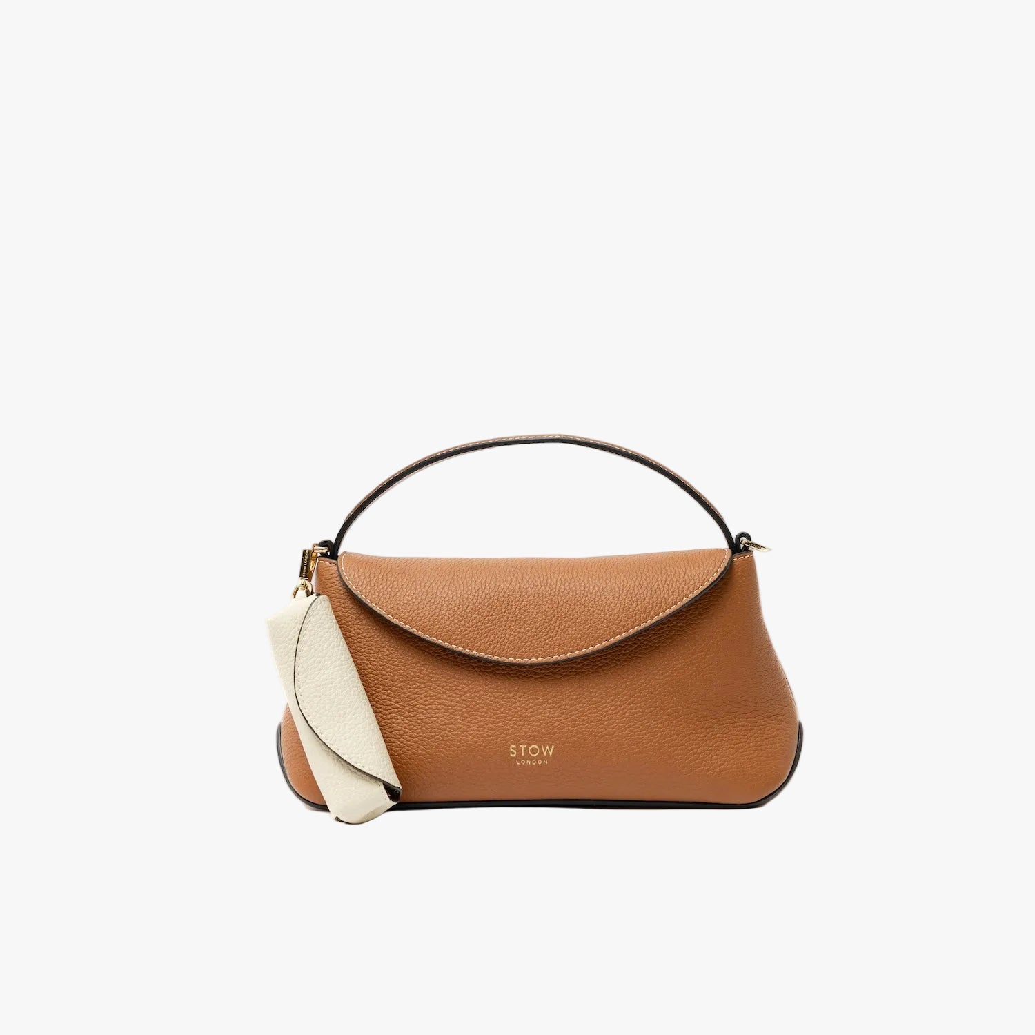 STOW London's Lipstick Case in Spring Moon pebbled leather attached to the Mini East West in Earth Tan leather featuring a gold-coated stainless steel clip on a light grey background