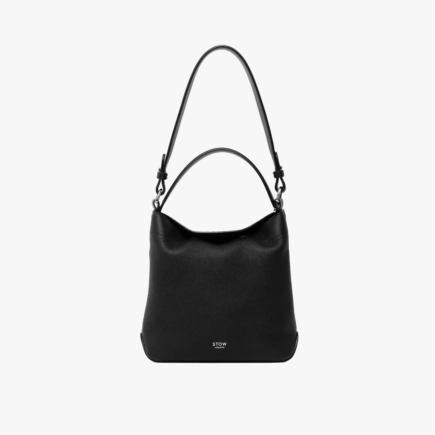 STOW London's Midi Curve and detachable shoulder strap and top handle in Black leather on a light grey background featuring silver hardware and details