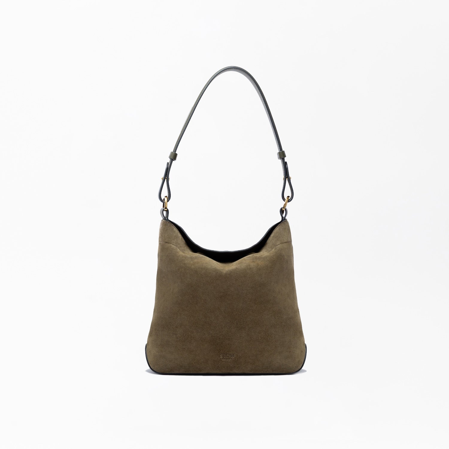 STOW London's Midi Curve in Dark Green suede leather on a light grey background featuring the detachable shoulder strap with gold hardware and details