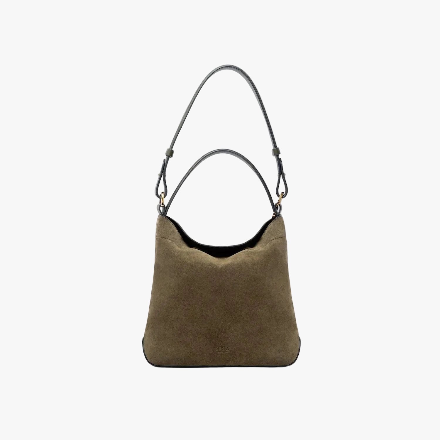 STOW London's Midi Curve in Dark Green suede leather on a light grey background featuring the detachable shoulder strap and top handle with gold hardware and details