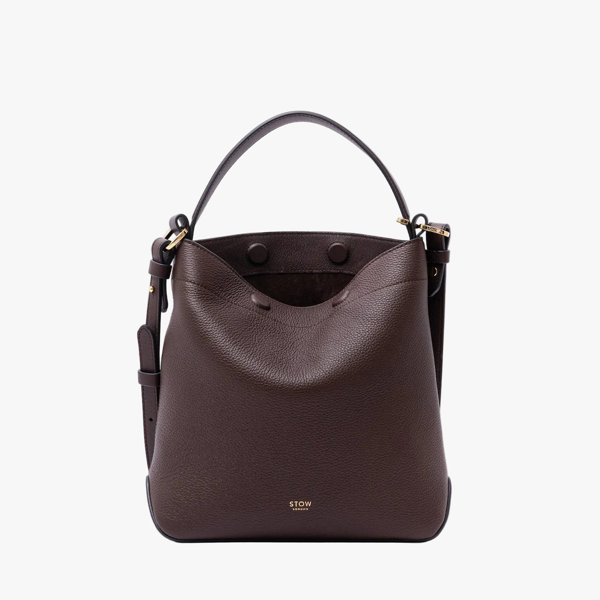 STOW London's Midi Curve in Espresso pebbled leather featuring the detachable crossbody strap and gold-coated stainless steel hardware on a light grey background