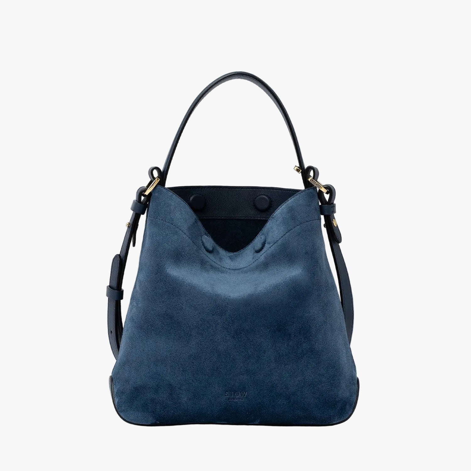 STOW London's Midi Curve in Navy suede leather featuring gold-coated stainless steel hardware on a light grey background