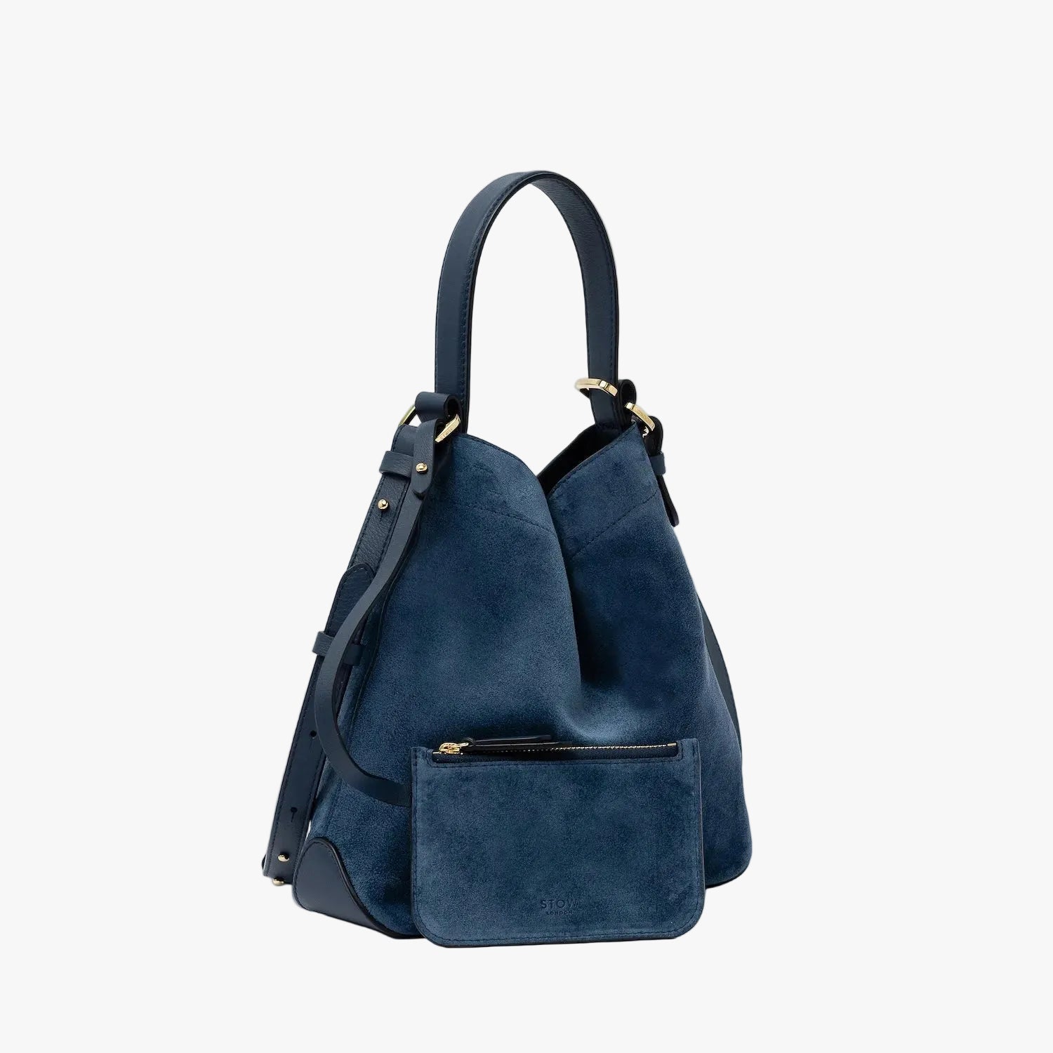 STOW London's Midi Curve in Navy suede leather with the matching, detachable interior pouch featuring gold-coated stainless steel hardware on a light grey background